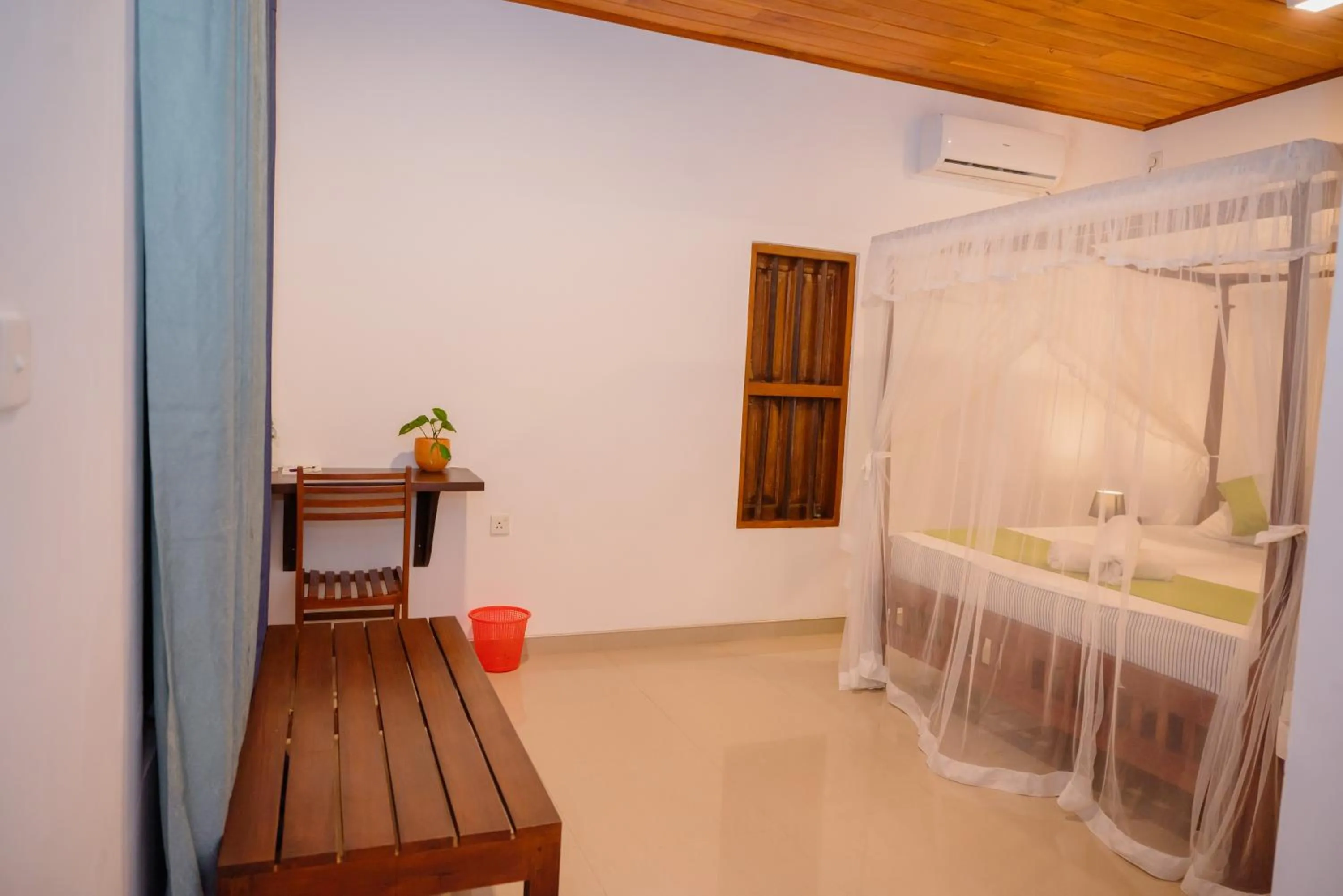 Bed in Shehani Beach Bungalow