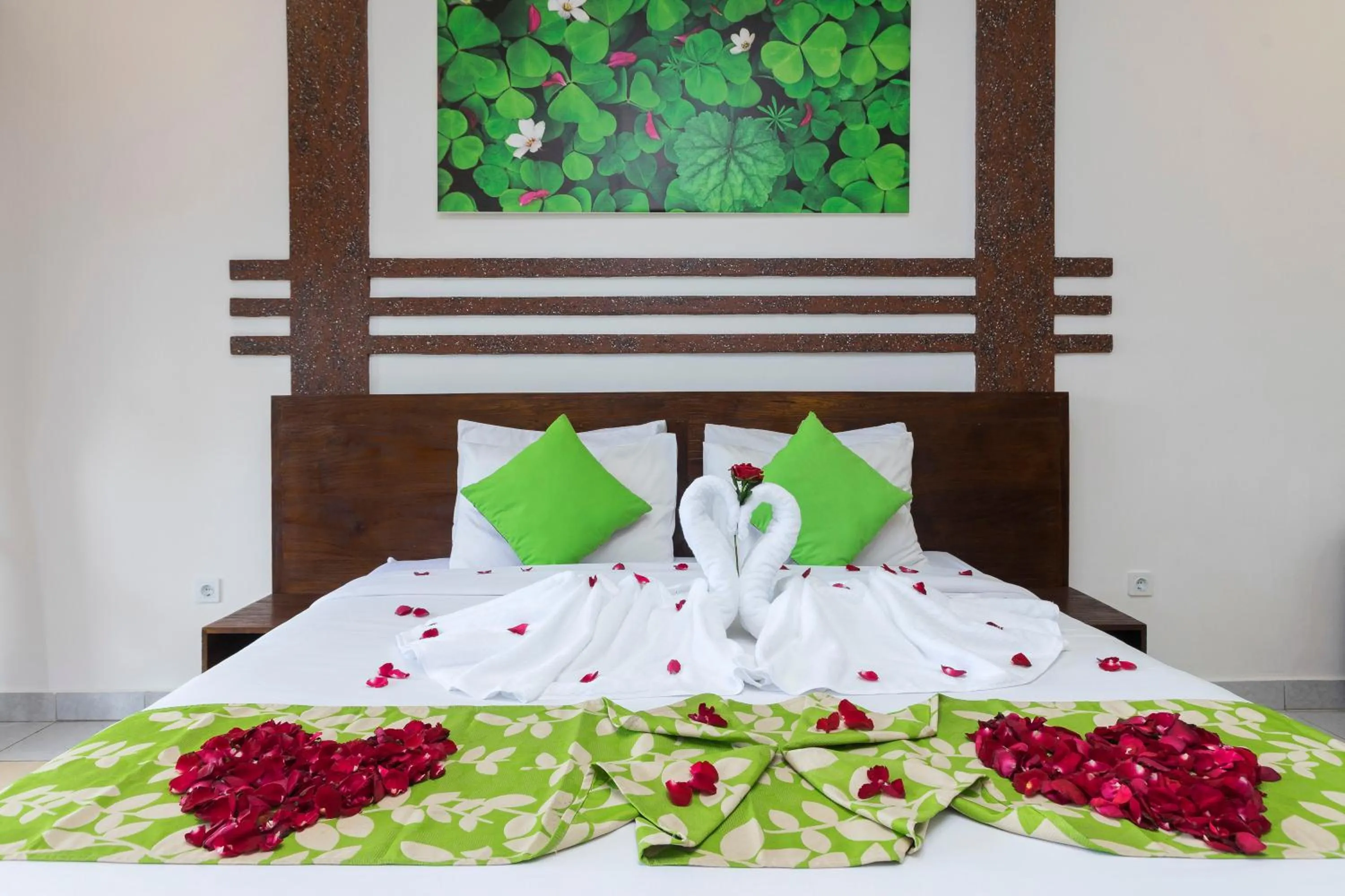 Decorative detail, Bed in Bali Wirasana Inn