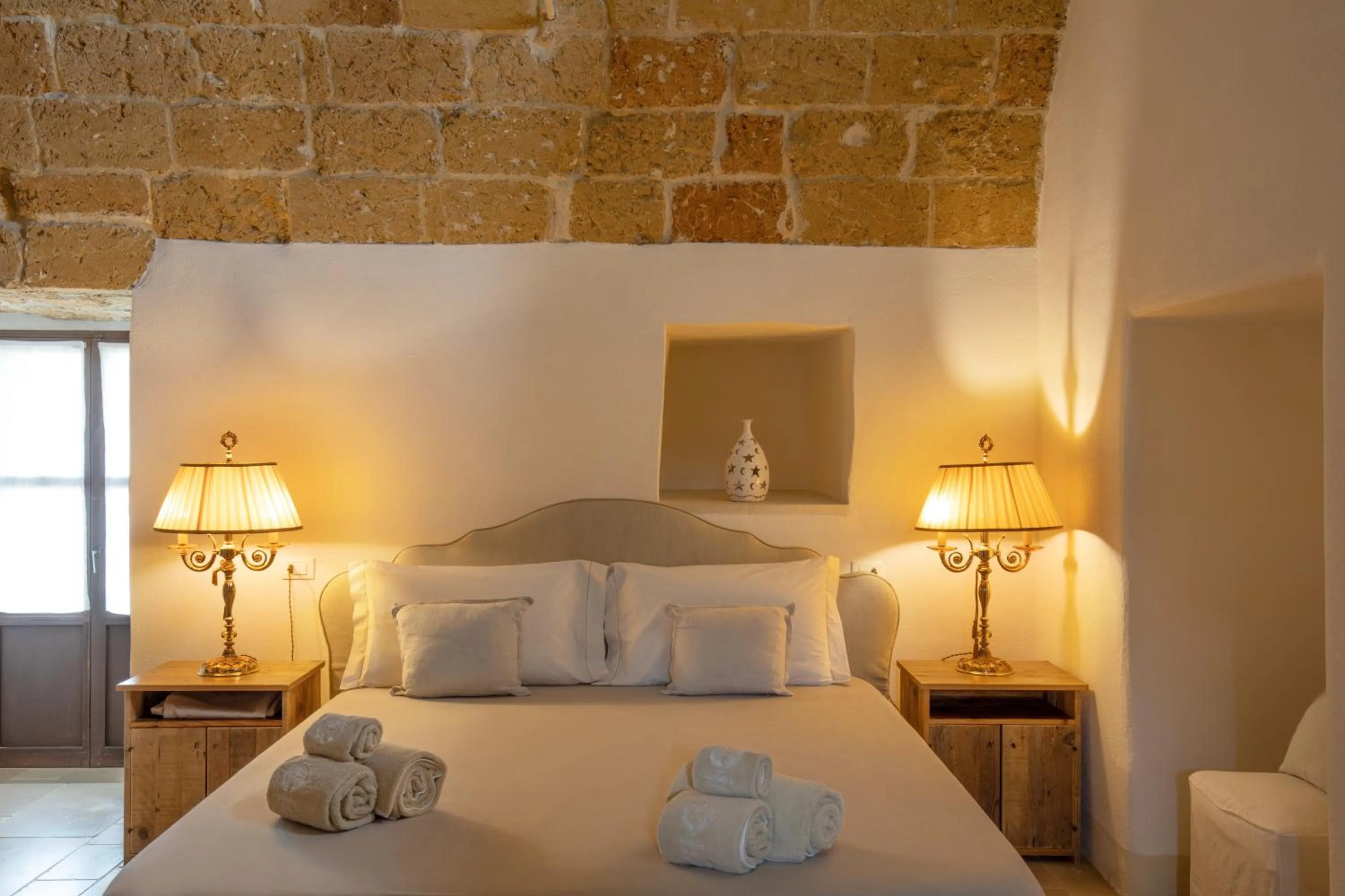 Bed in Masseria Fano Relais & Wine