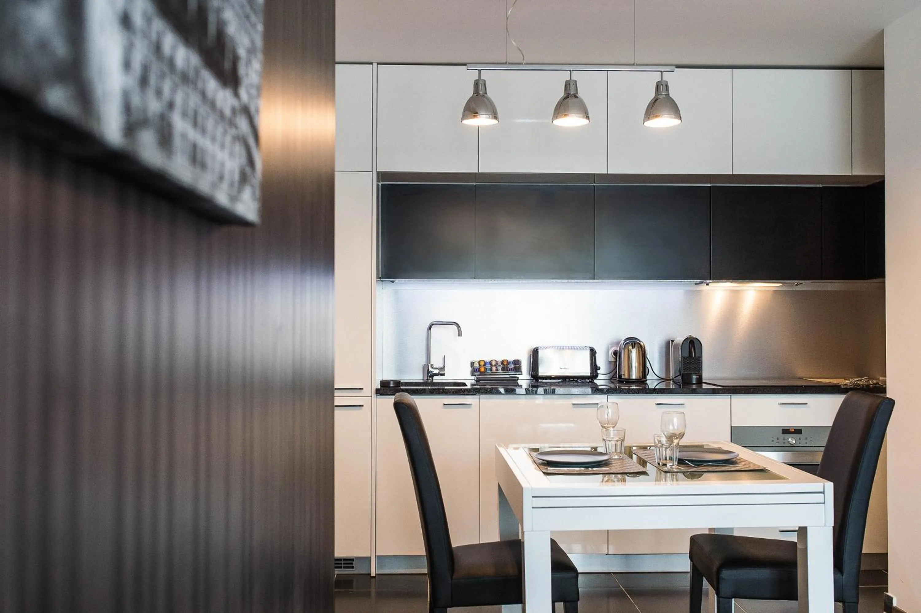 Kitchen or kitchenette in Les Appartements Paris Clichy