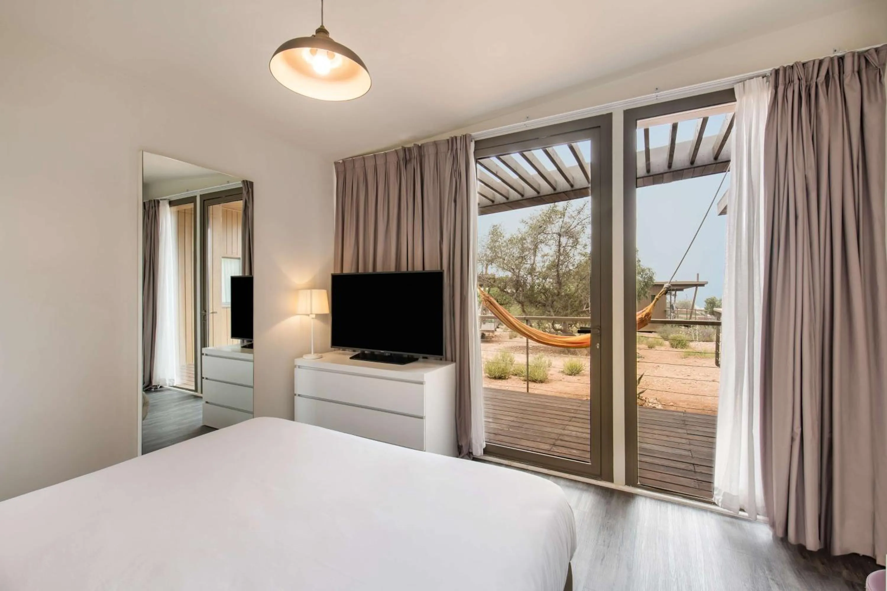 Photo of the whole room, Bed in Radisson Blu Resort Taghazout Bay Surf Village
