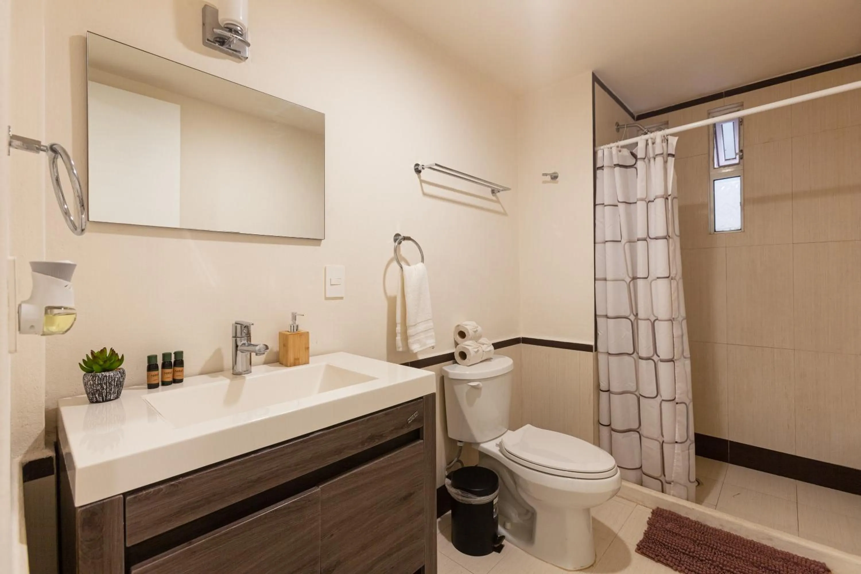 Shower in Via Tendenza Condos