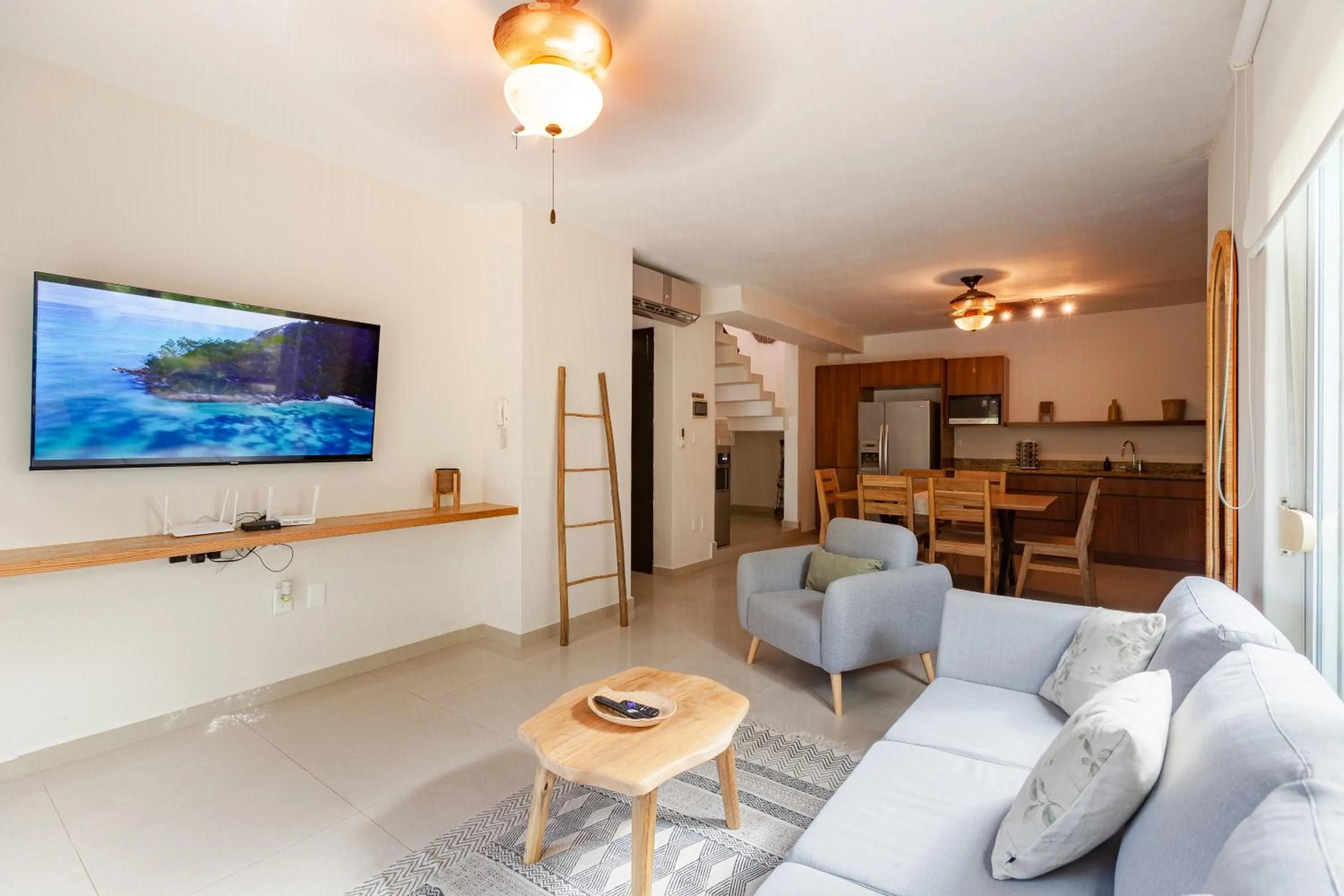 Communal lounge/ TV room in Via Tendenza Condos