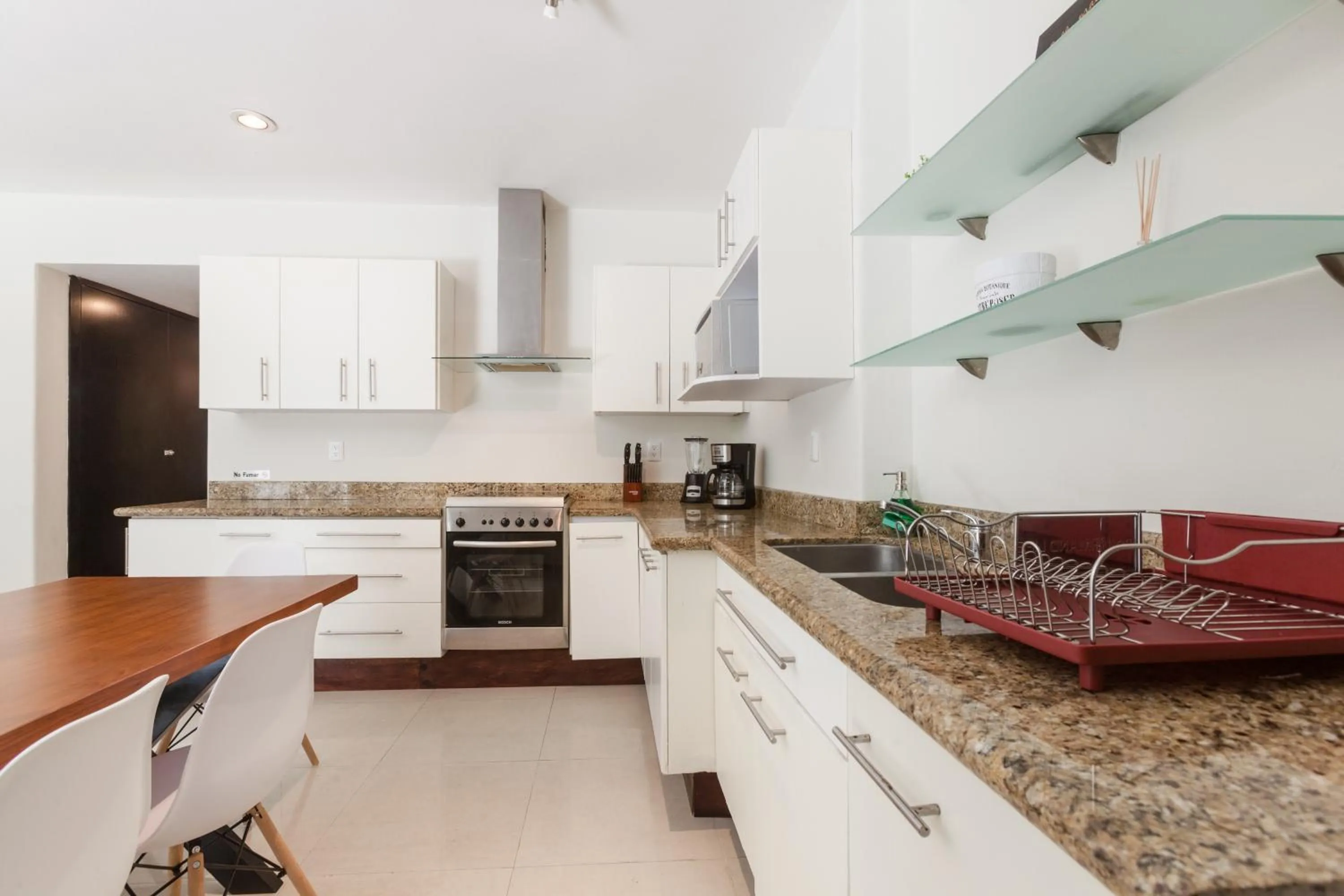 Kitchen or kitchenette in Via Tendenza Condos