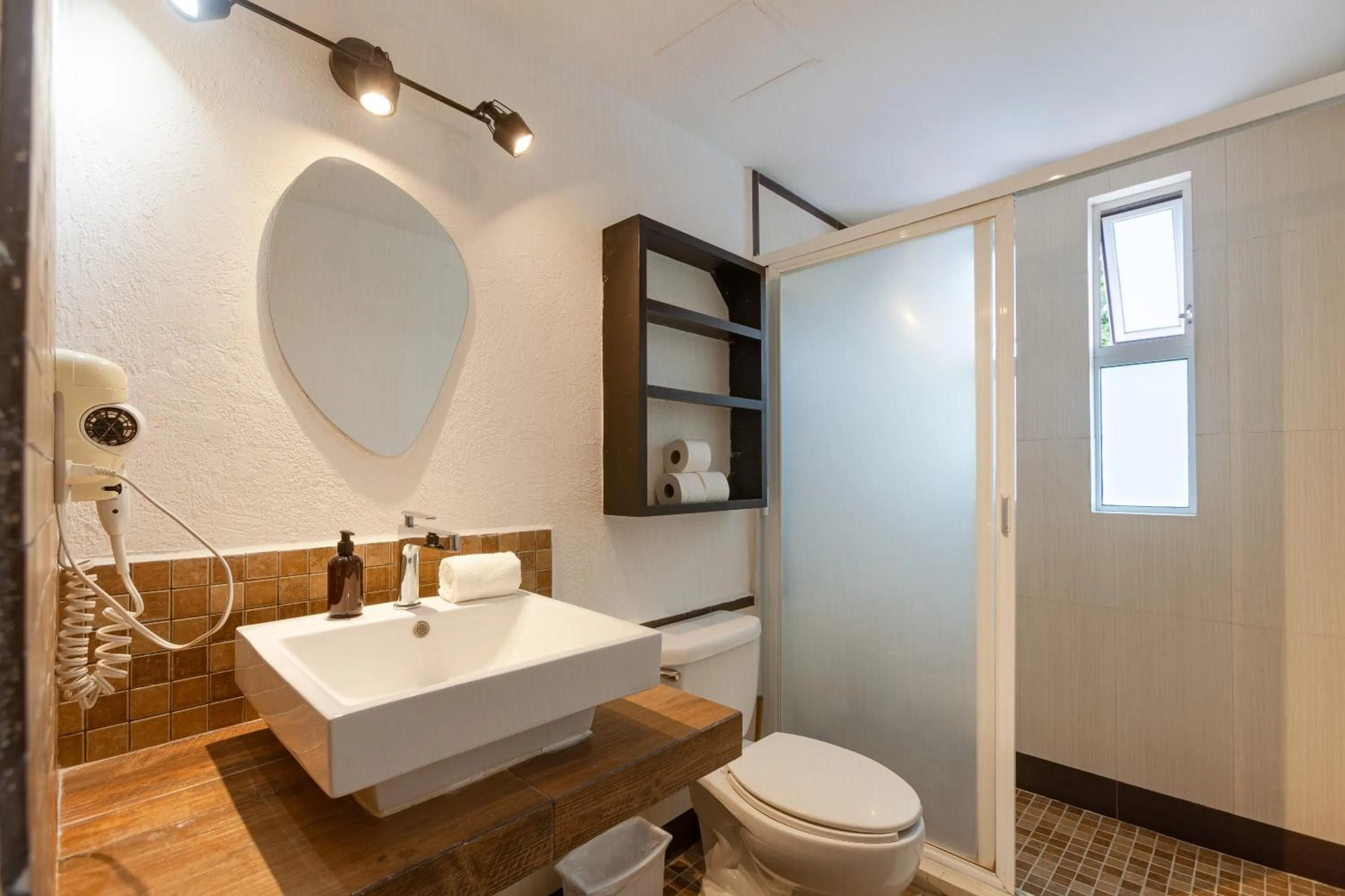 Shower in Via Tendenza Condos