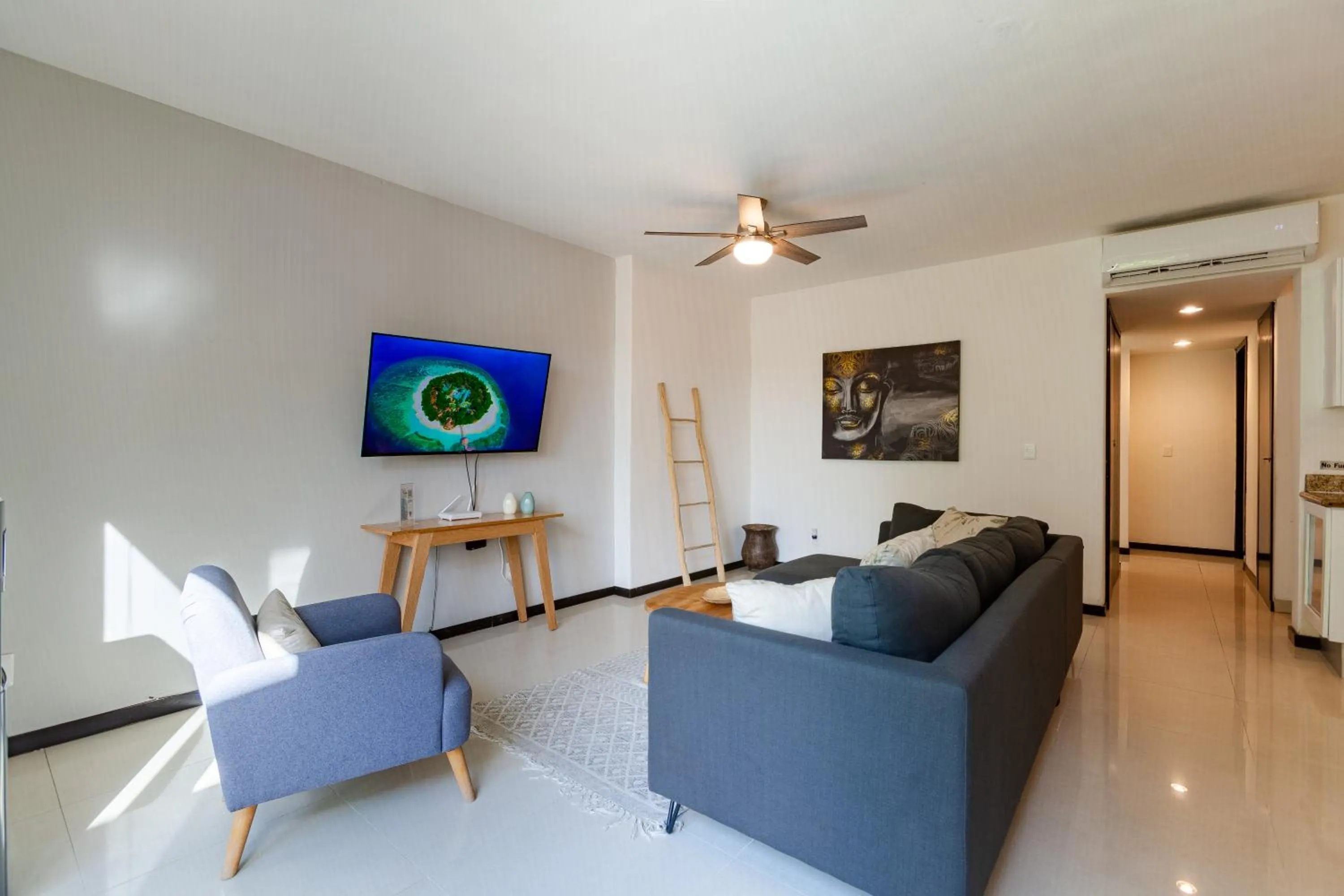 Communal lounge/ TV room in Via Tendenza Condos