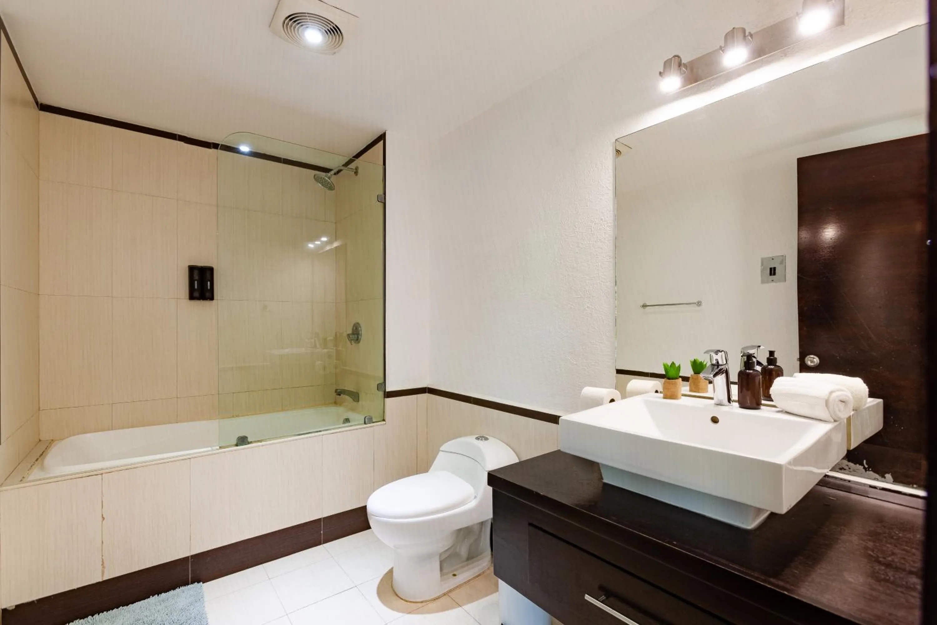 Shower in Via Tendenza Condos