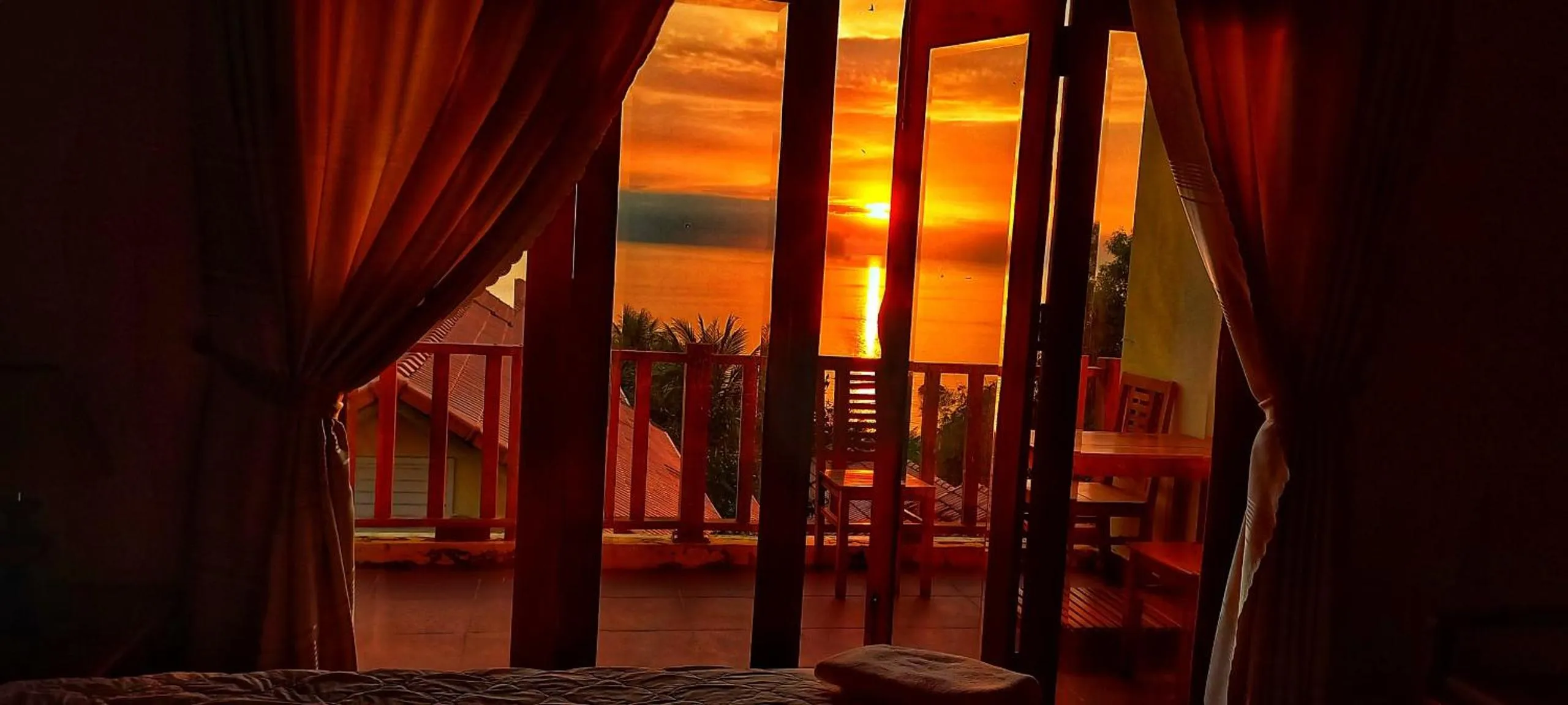 Balcony/Terrace, Bed in Free Beach Resort