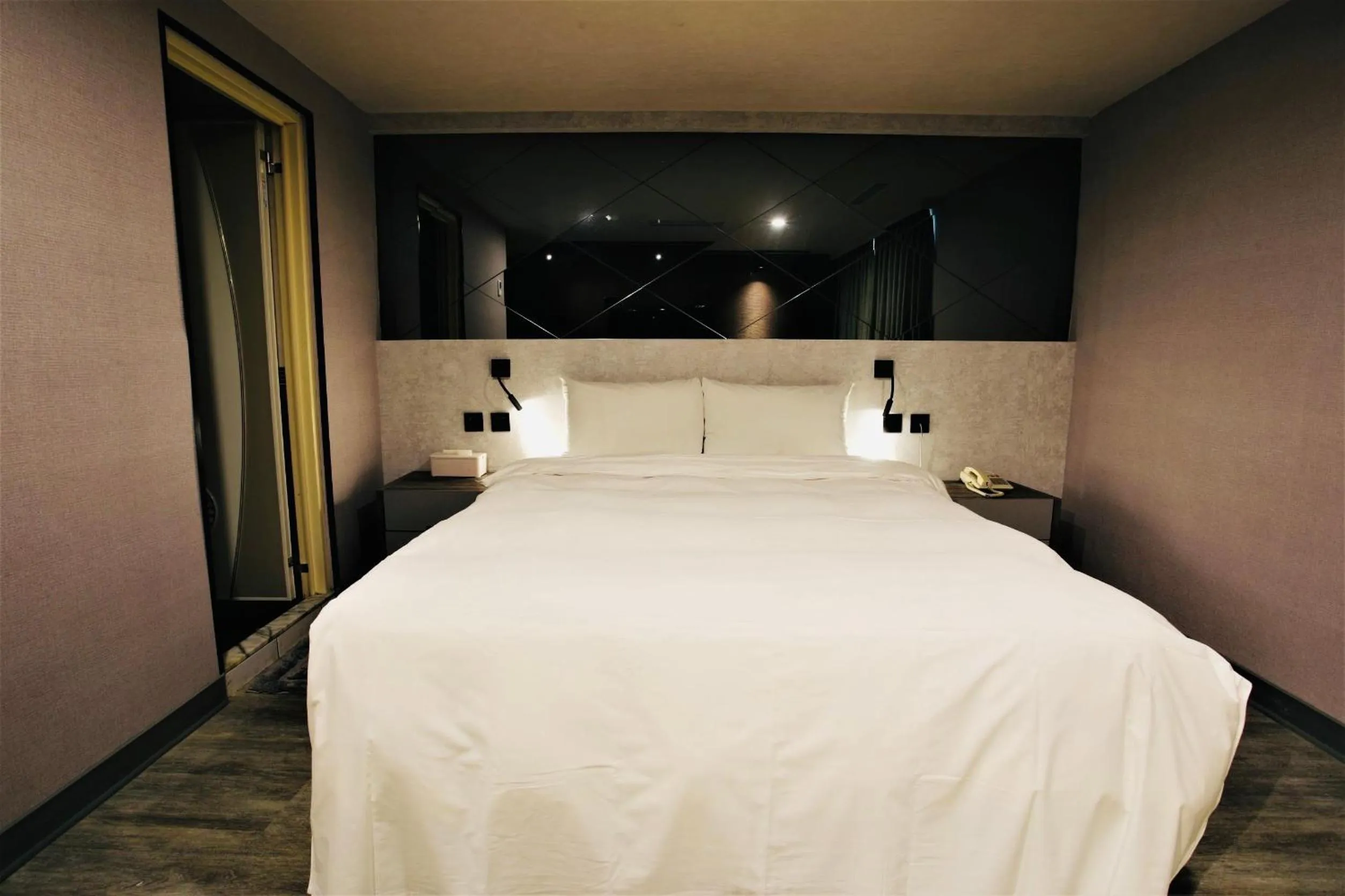 Bed in Golden Home Hotel