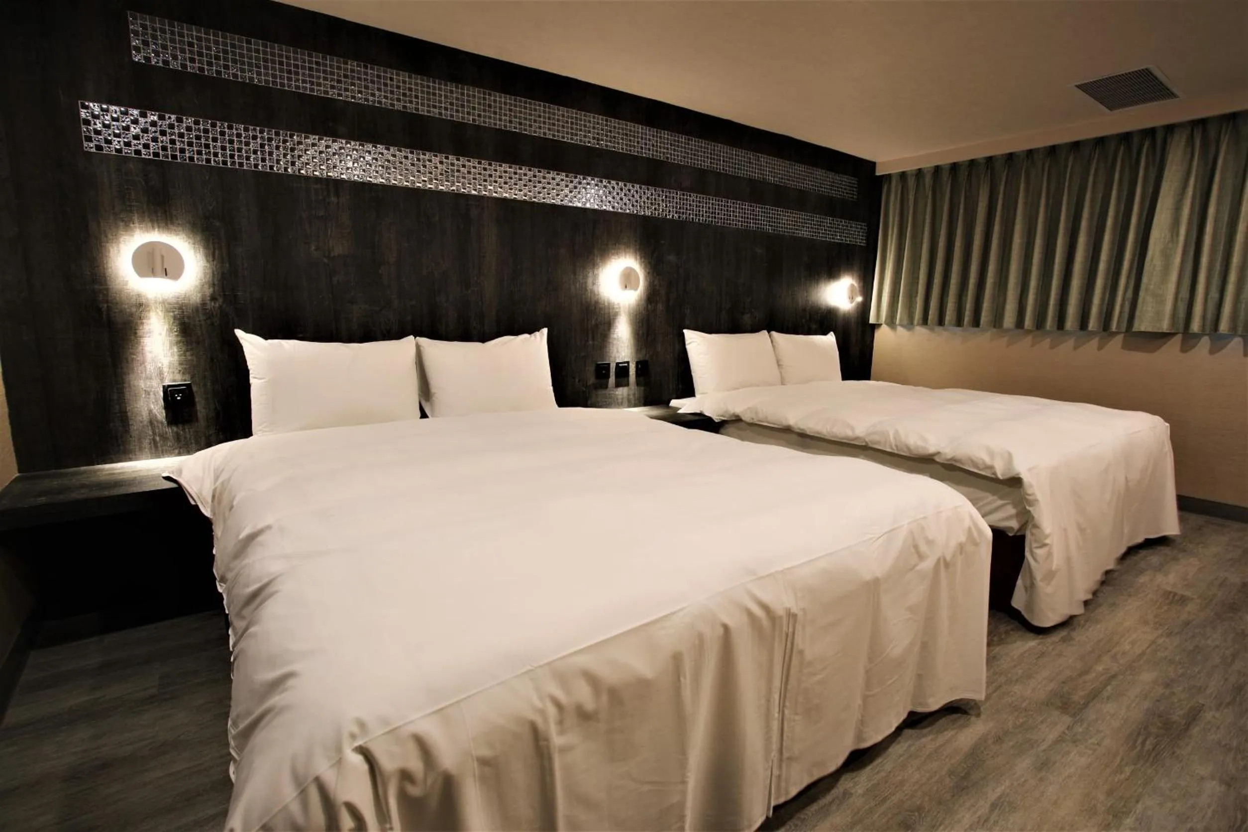Bed in Golden Home Hotel