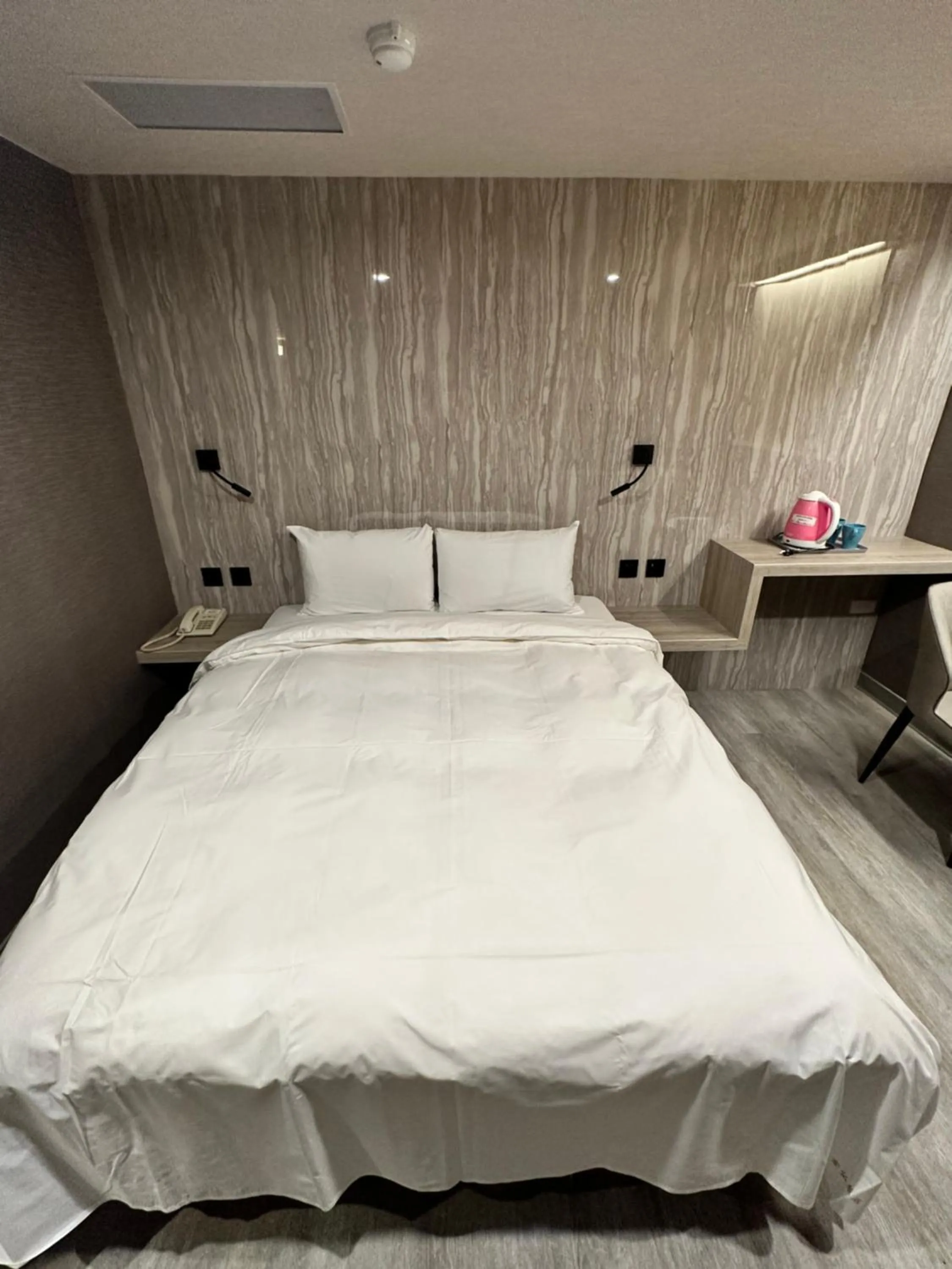 Bed in Golden Home Hotel