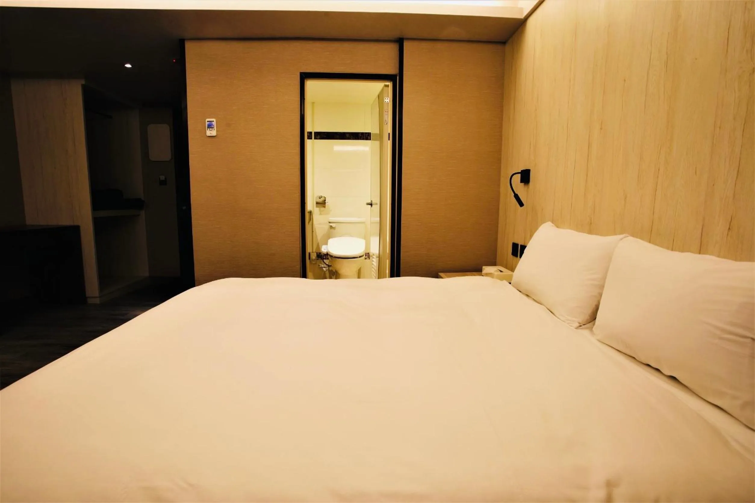 Bed in Golden Home Hotel