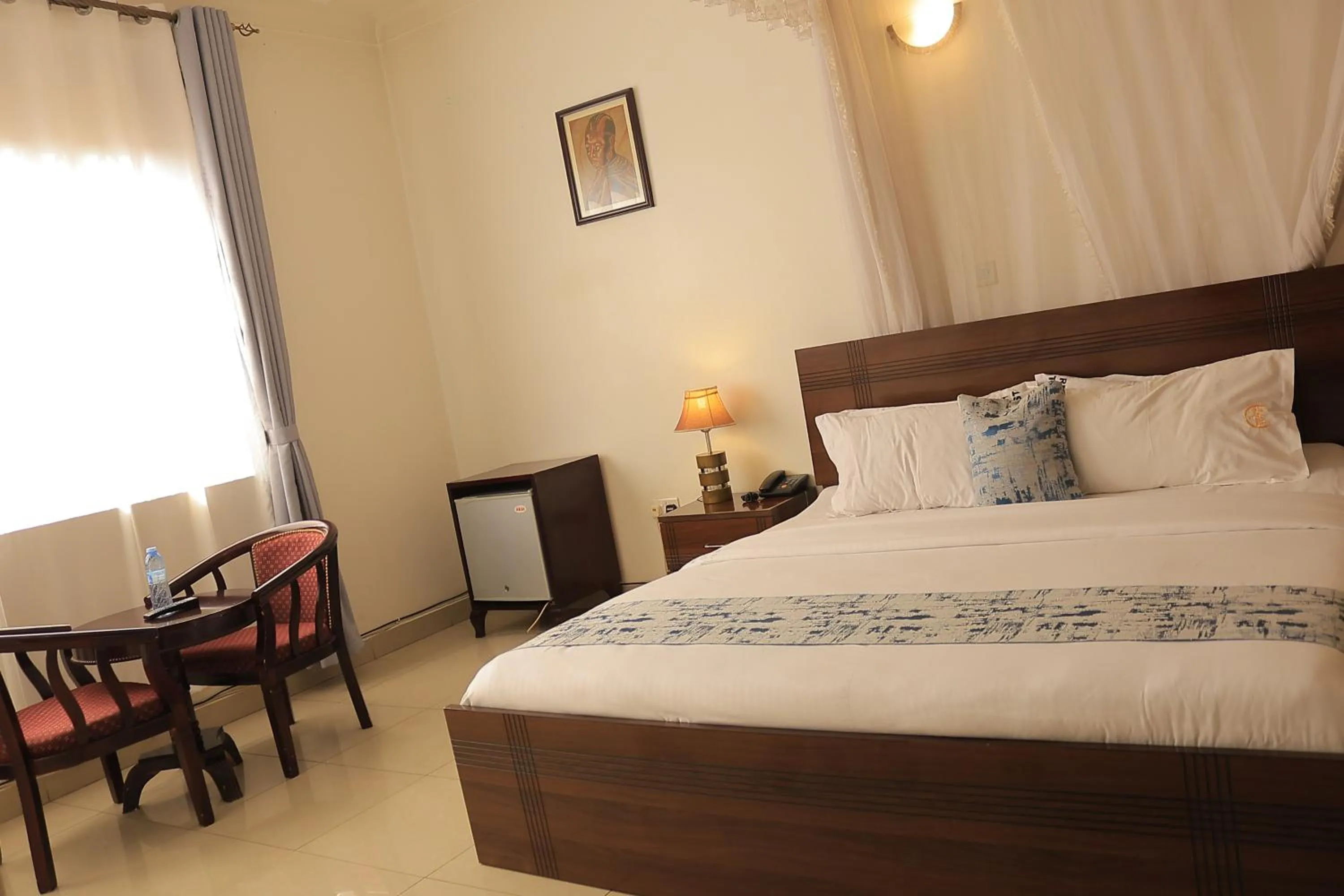 Photo of the whole room, Bed in Reinah Tourist Hotel