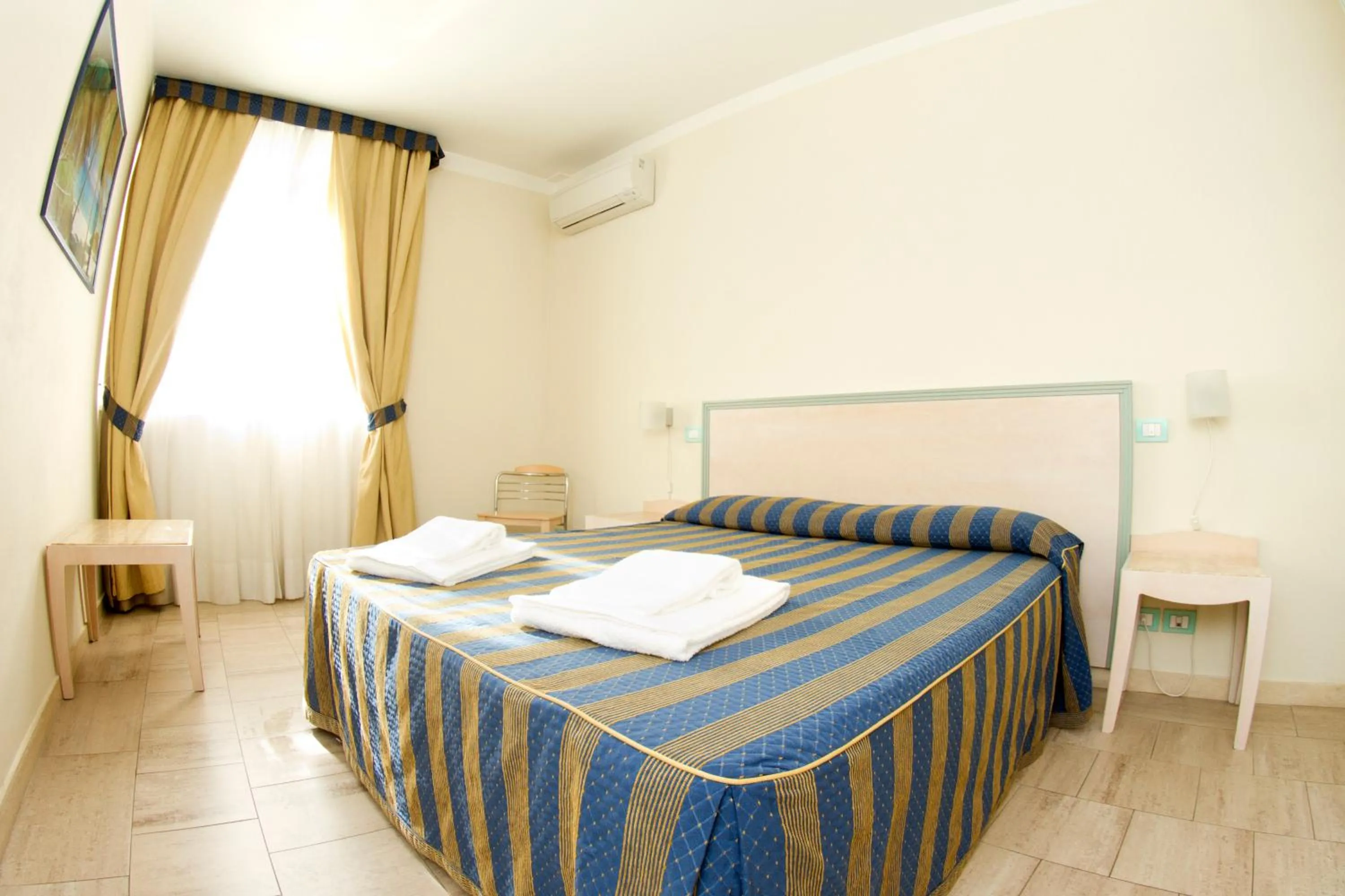 Bed in Onda Marina Residence Rta