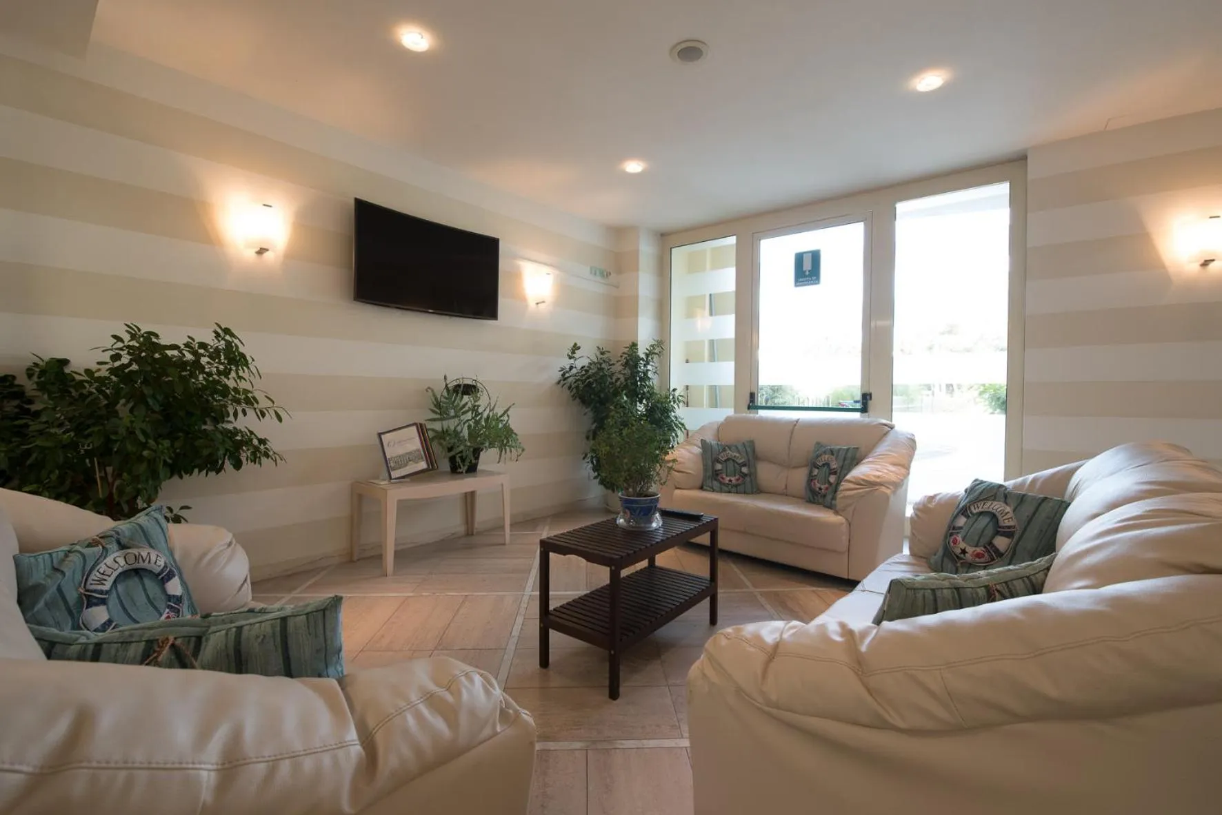 Communal lounge/ TV room in Onda Marina Residence Rta