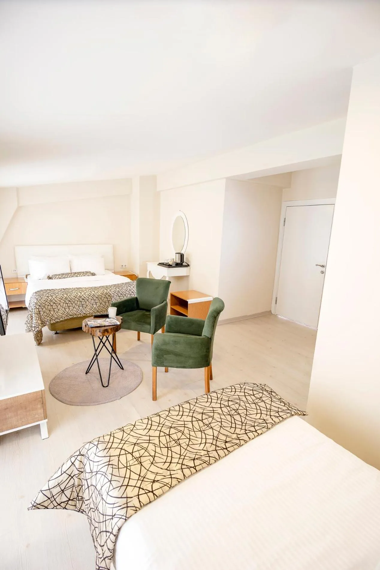 Bed in The Corner Inn Hotels By Suit