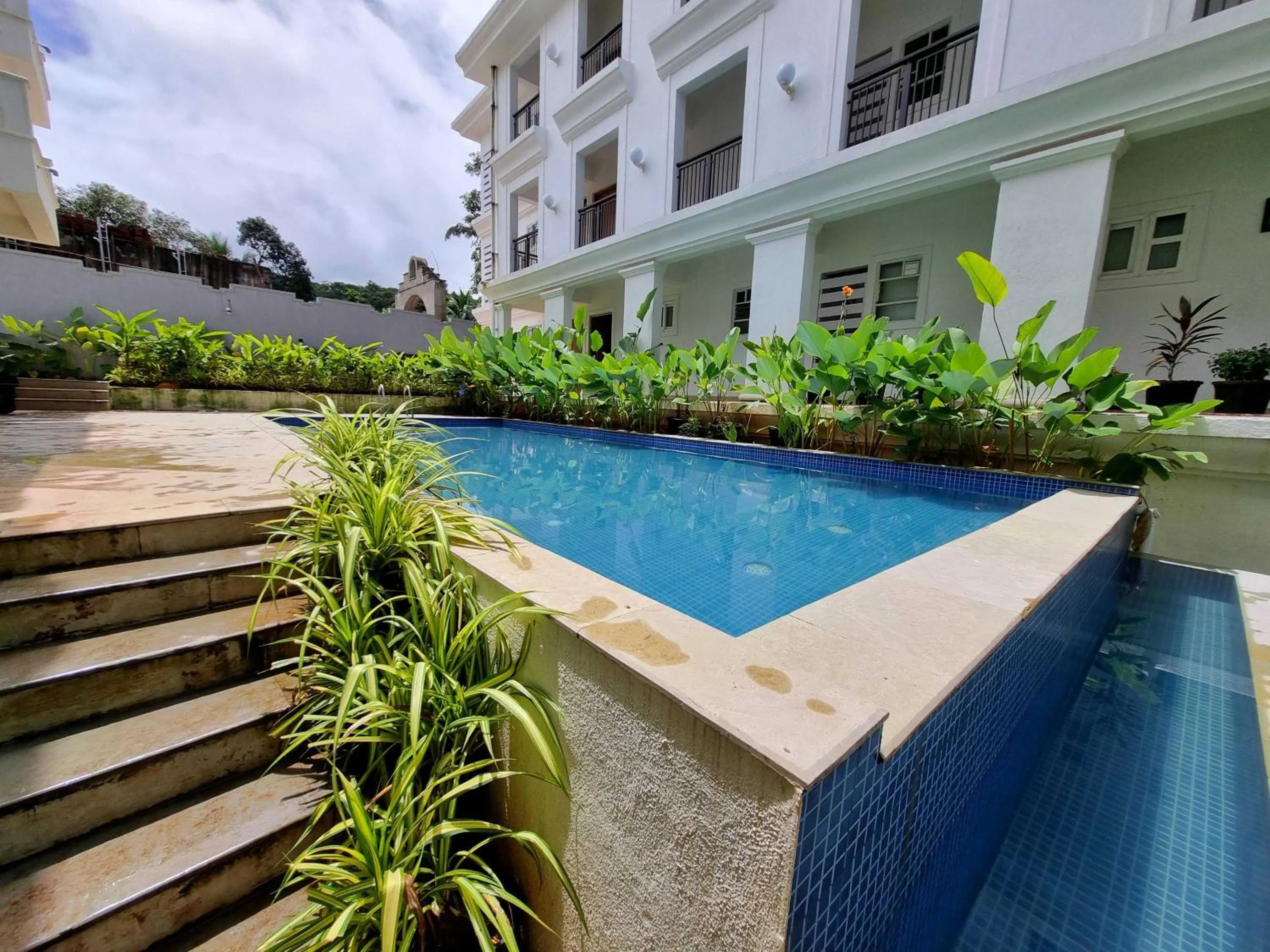 Swimming pool in Sereno By Dancenter - 1 BHK Apartment In Siolim