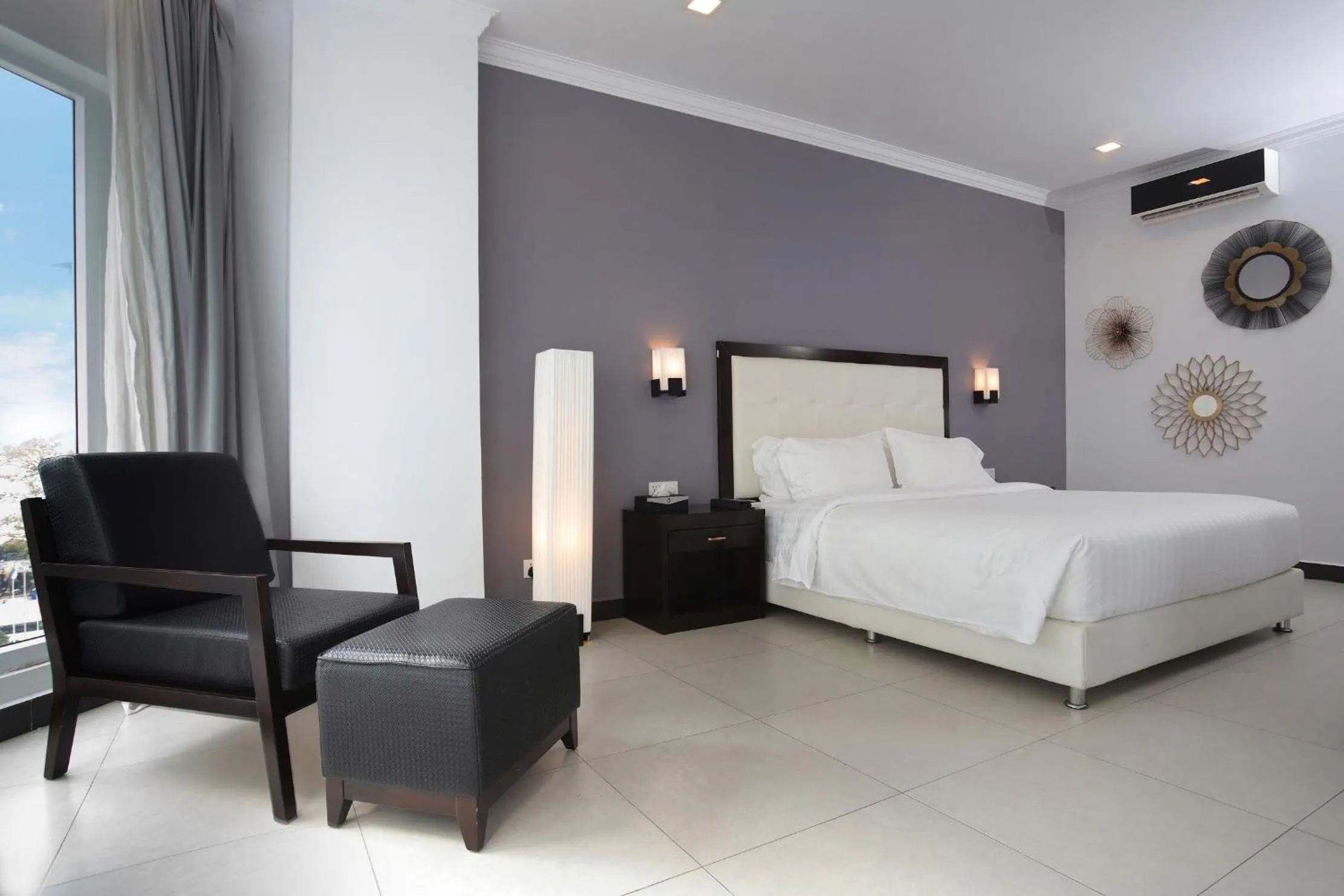 Photo of the whole room, Bed in Queenco Hotel & Casino