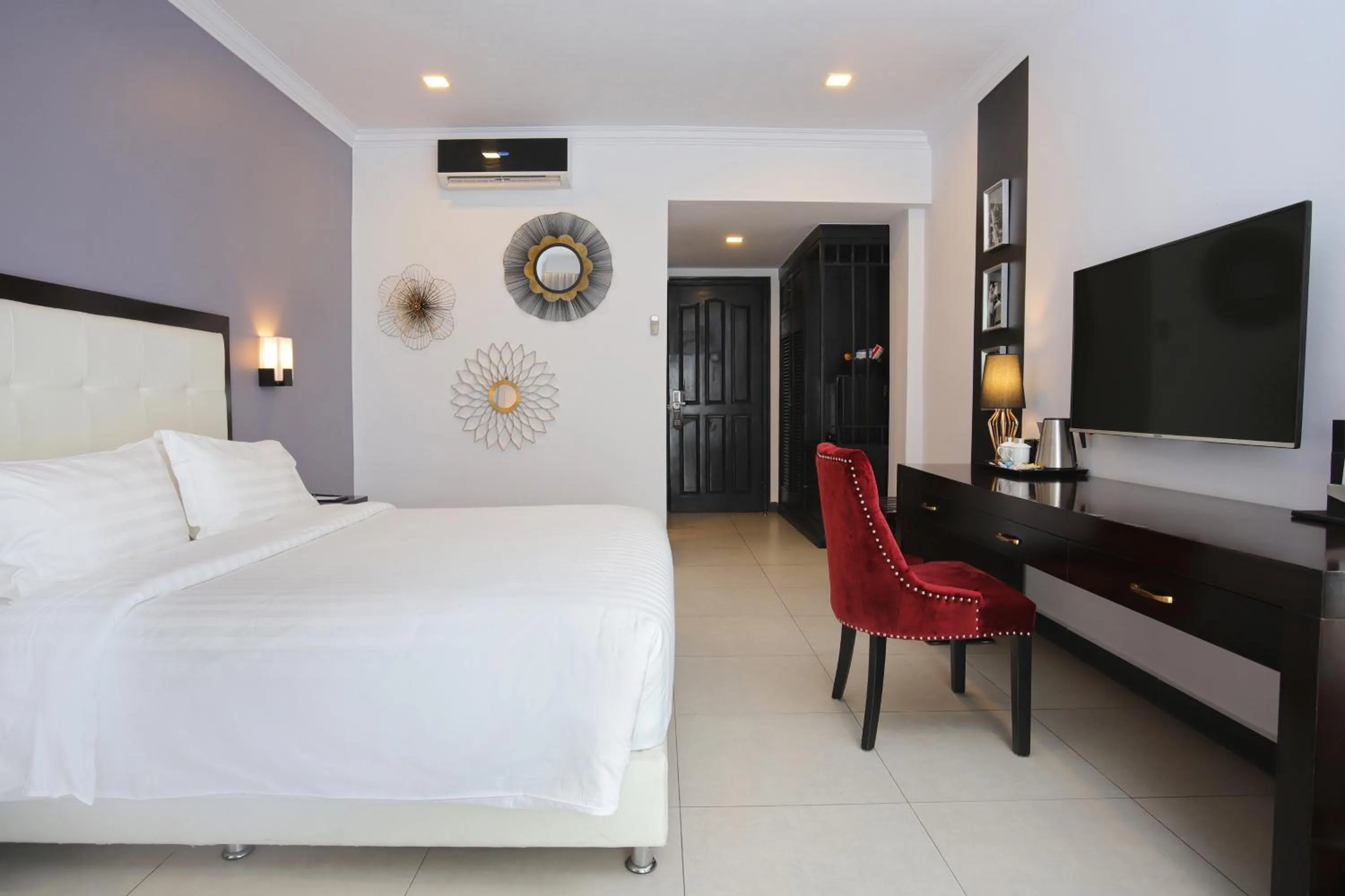 Bed in Queenco Hotel & Casino