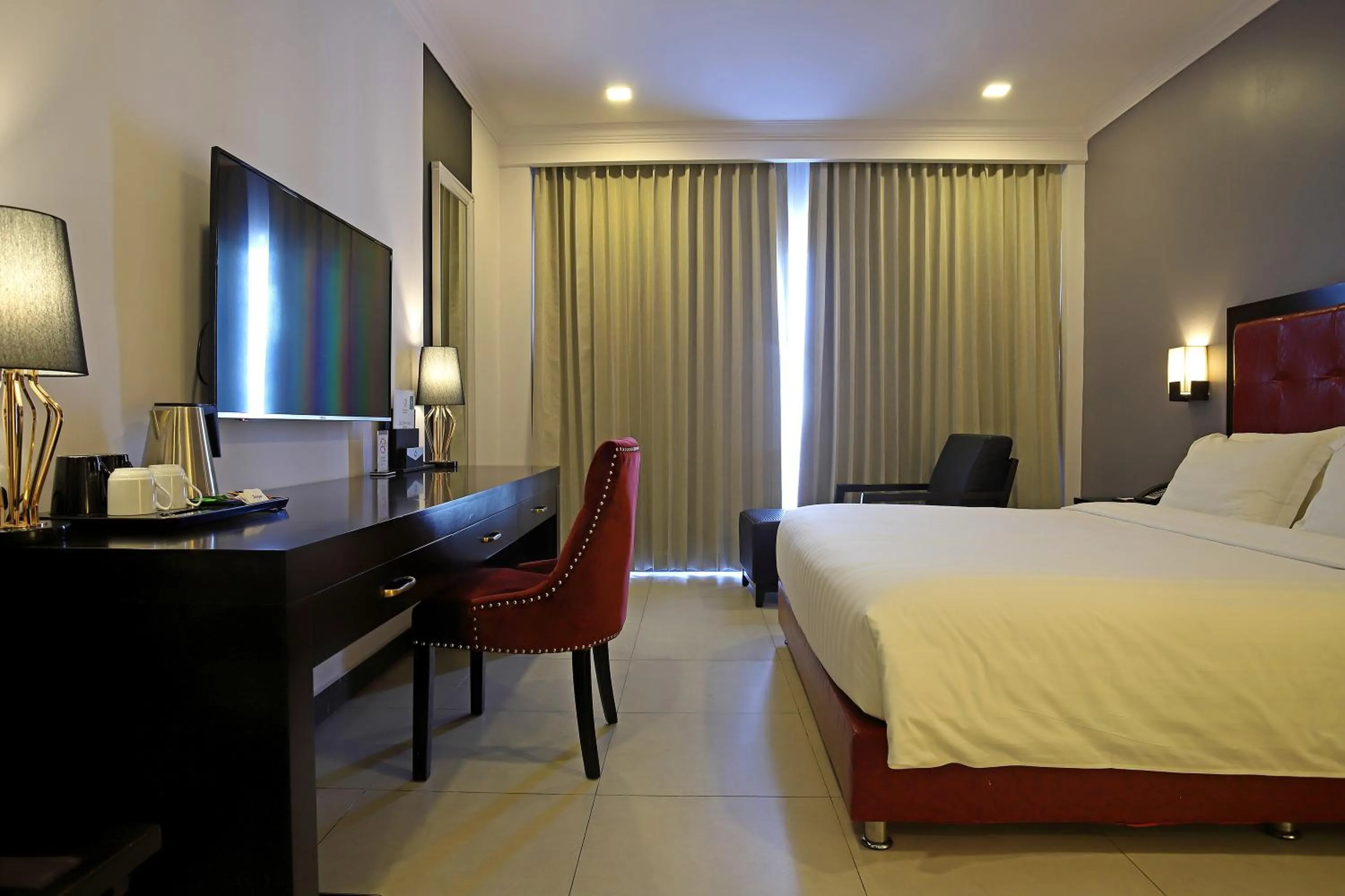 Bed in Queenco Hotel & Casino