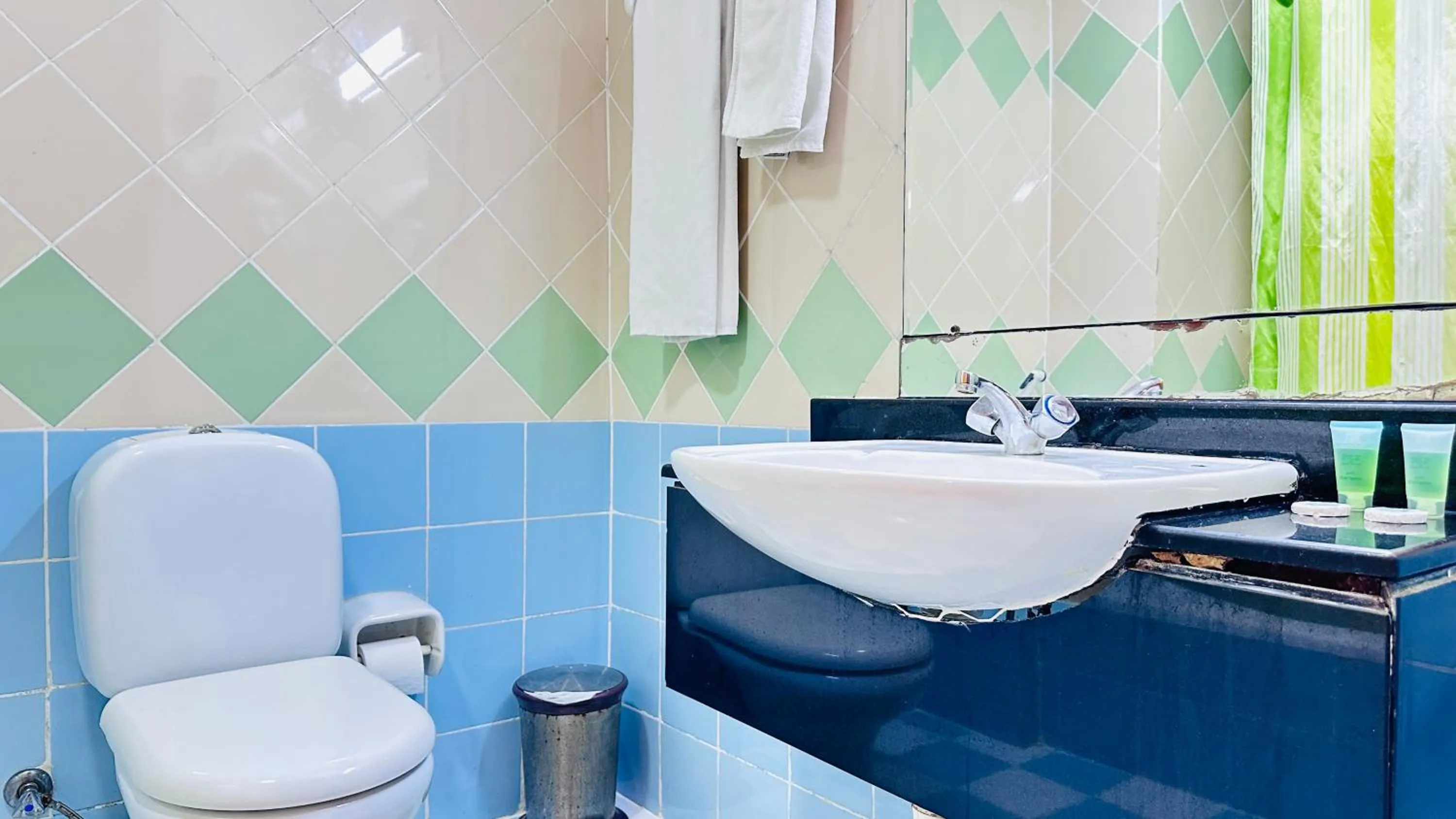 Bathroom in Collection O San Marino Hotel