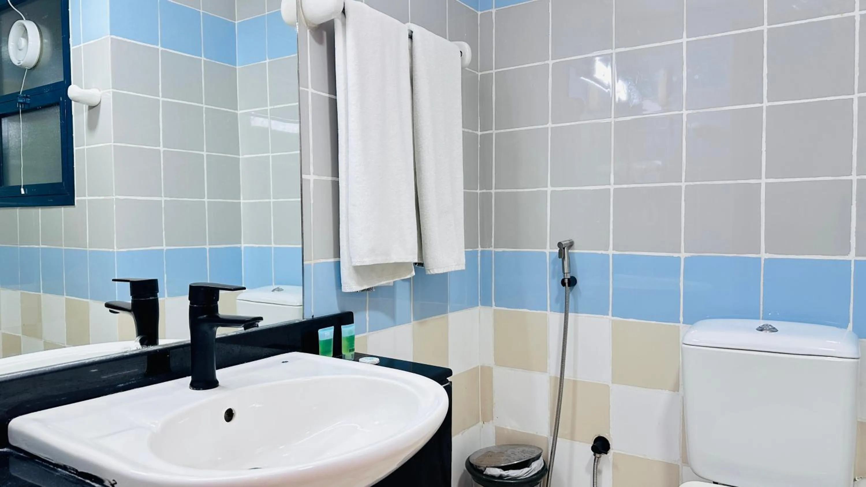 Bathroom in Collection O San Marino Hotel