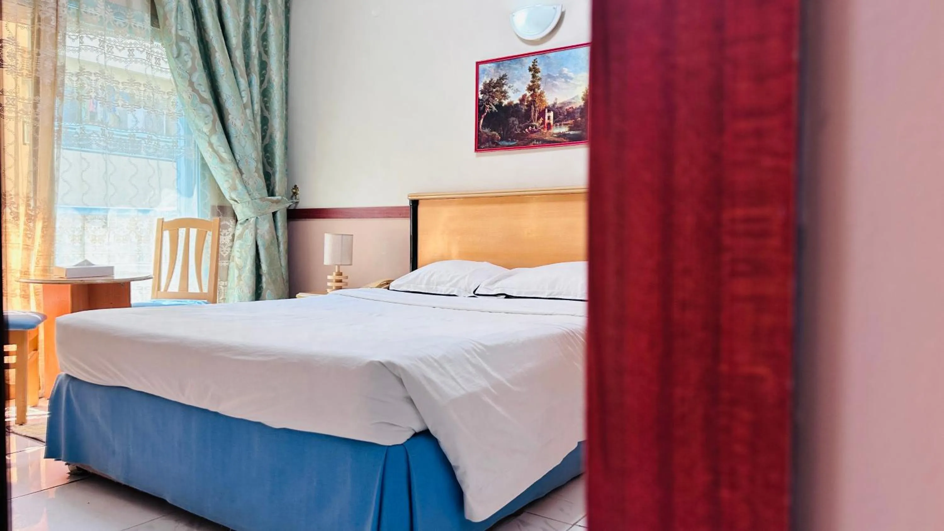 Photo of the whole room, Bed in Collection O San Marino Hotel