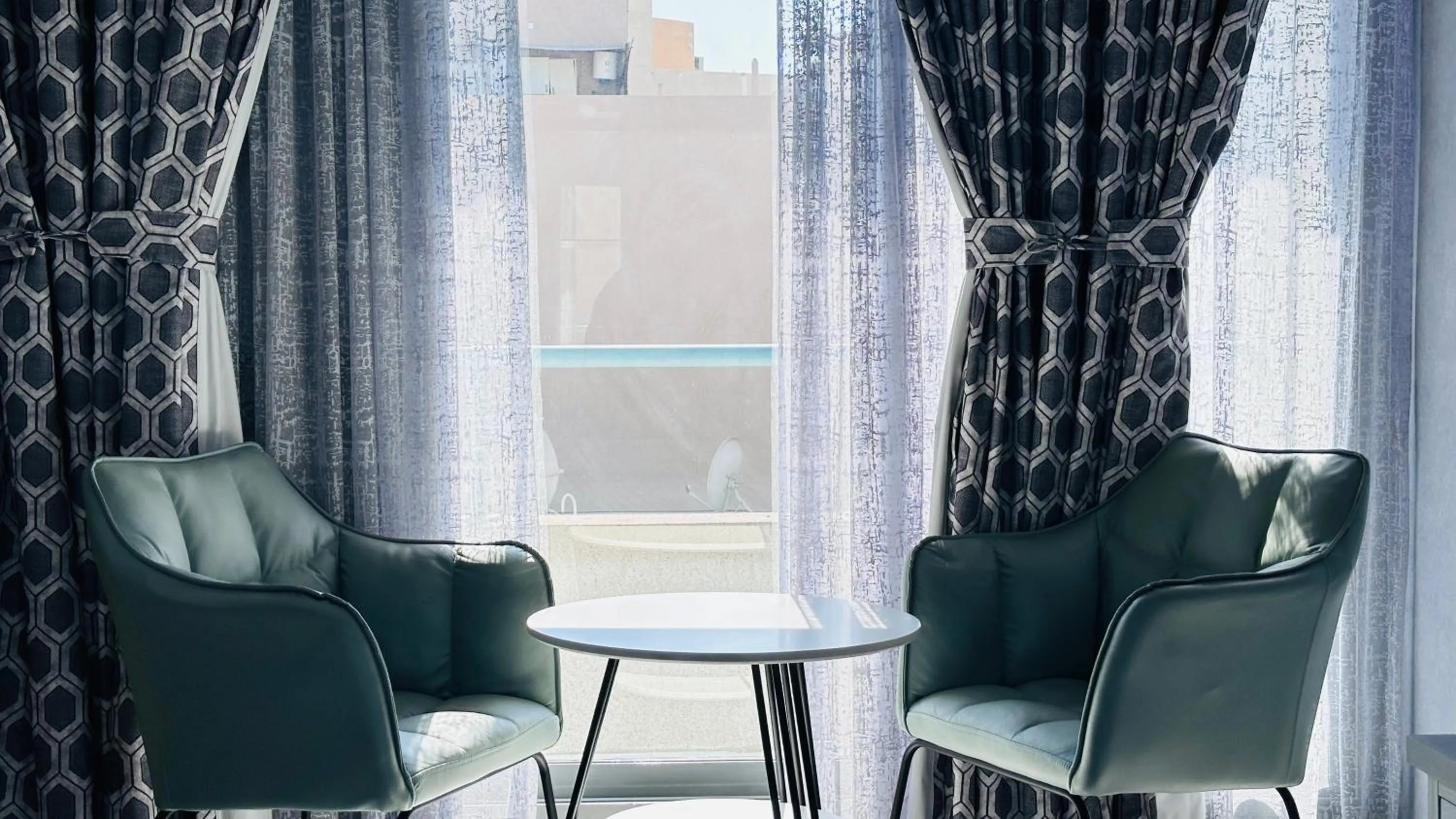 Seating area in Collection O San Marino Hotel