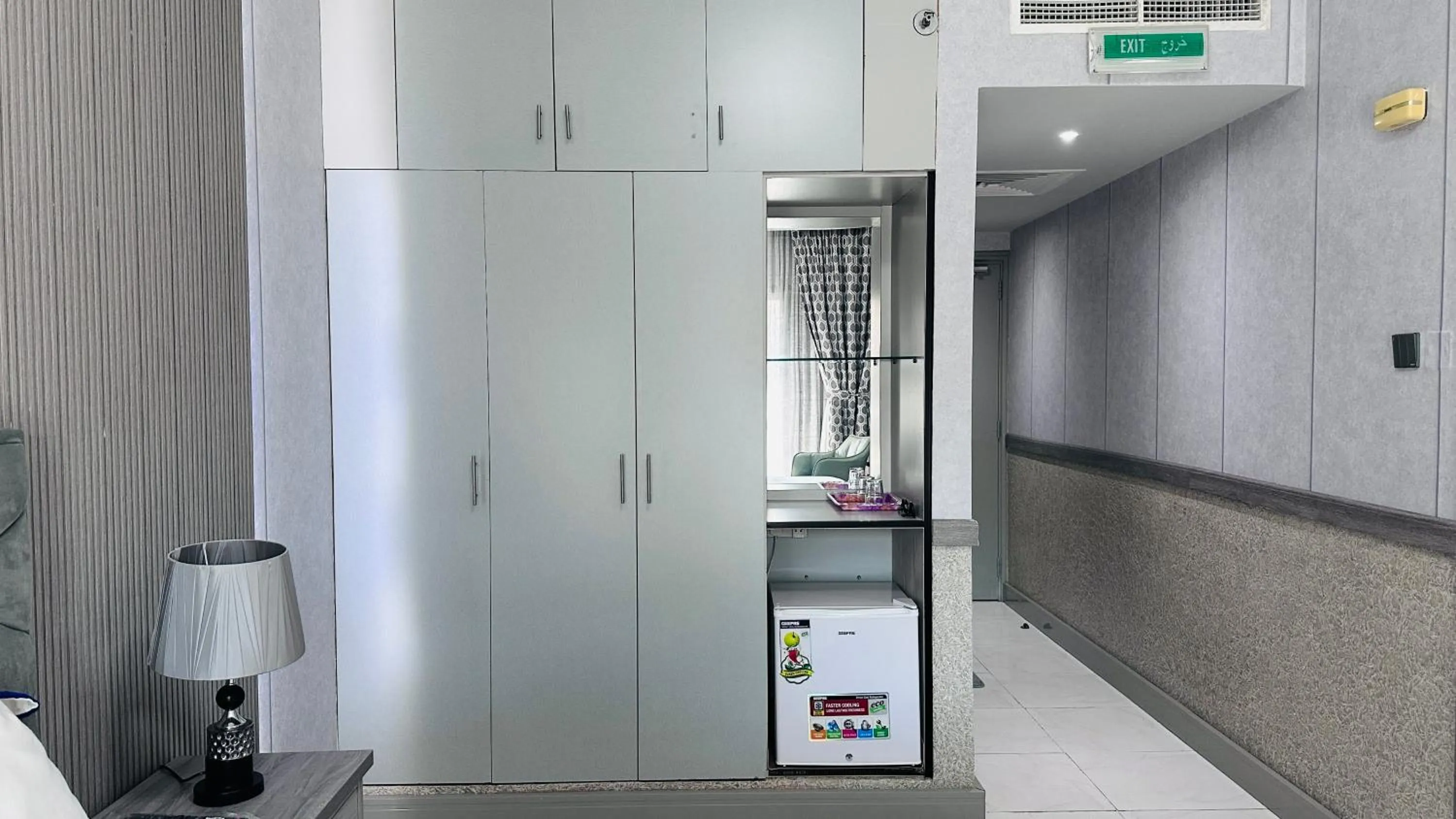 wardrobe in Collection O San Marino Hotel