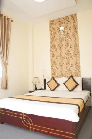 Bed in Dong Bao Hotel