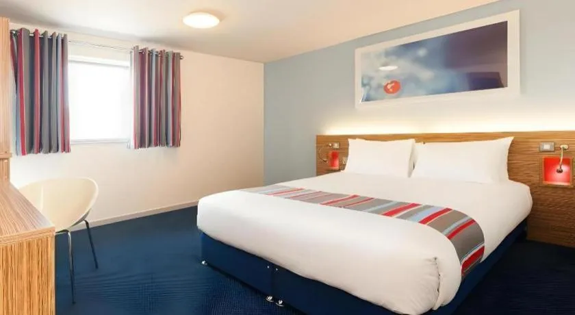 Bed in Travelodge Cambridge Orchard Park