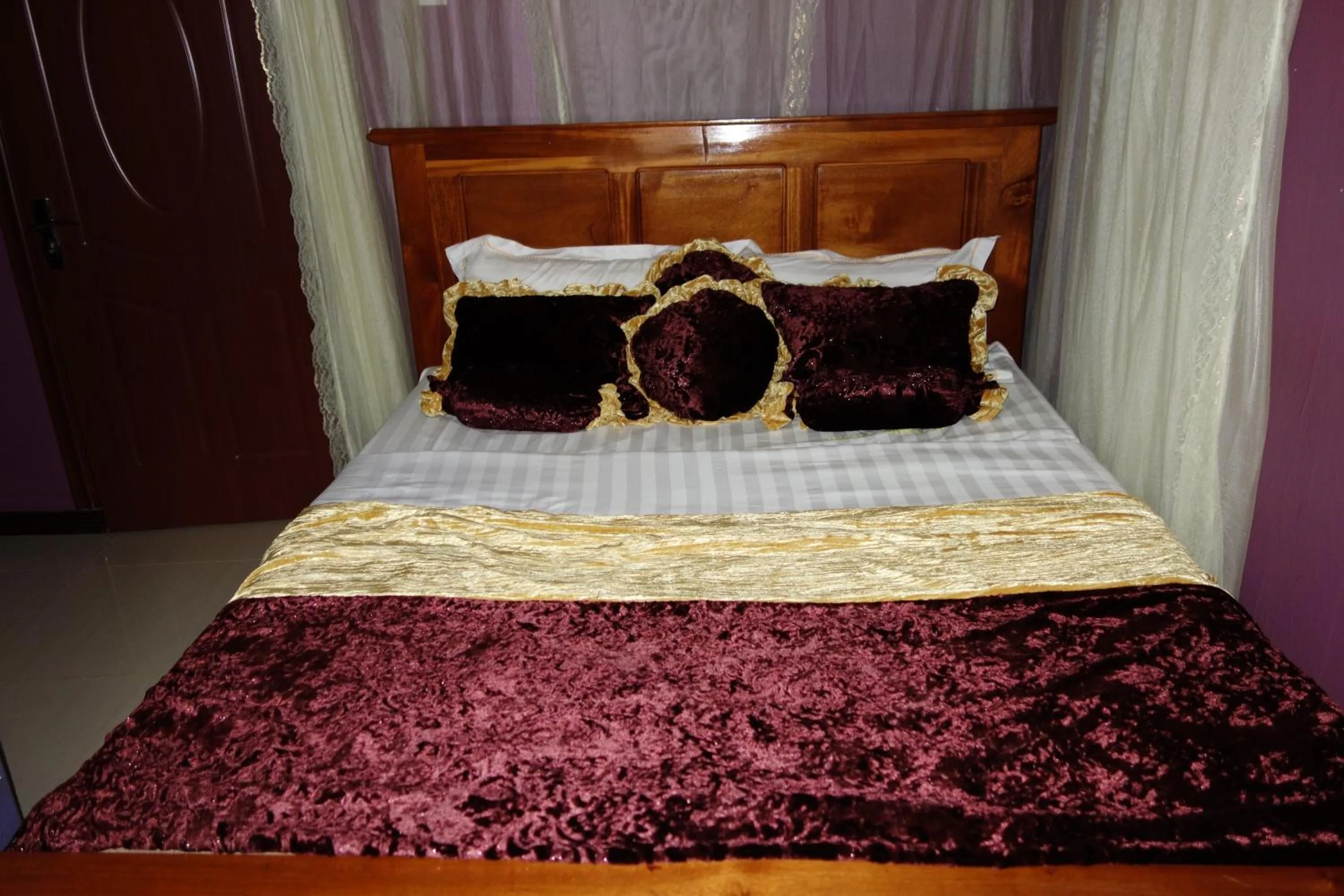 Bed in Impala Suites