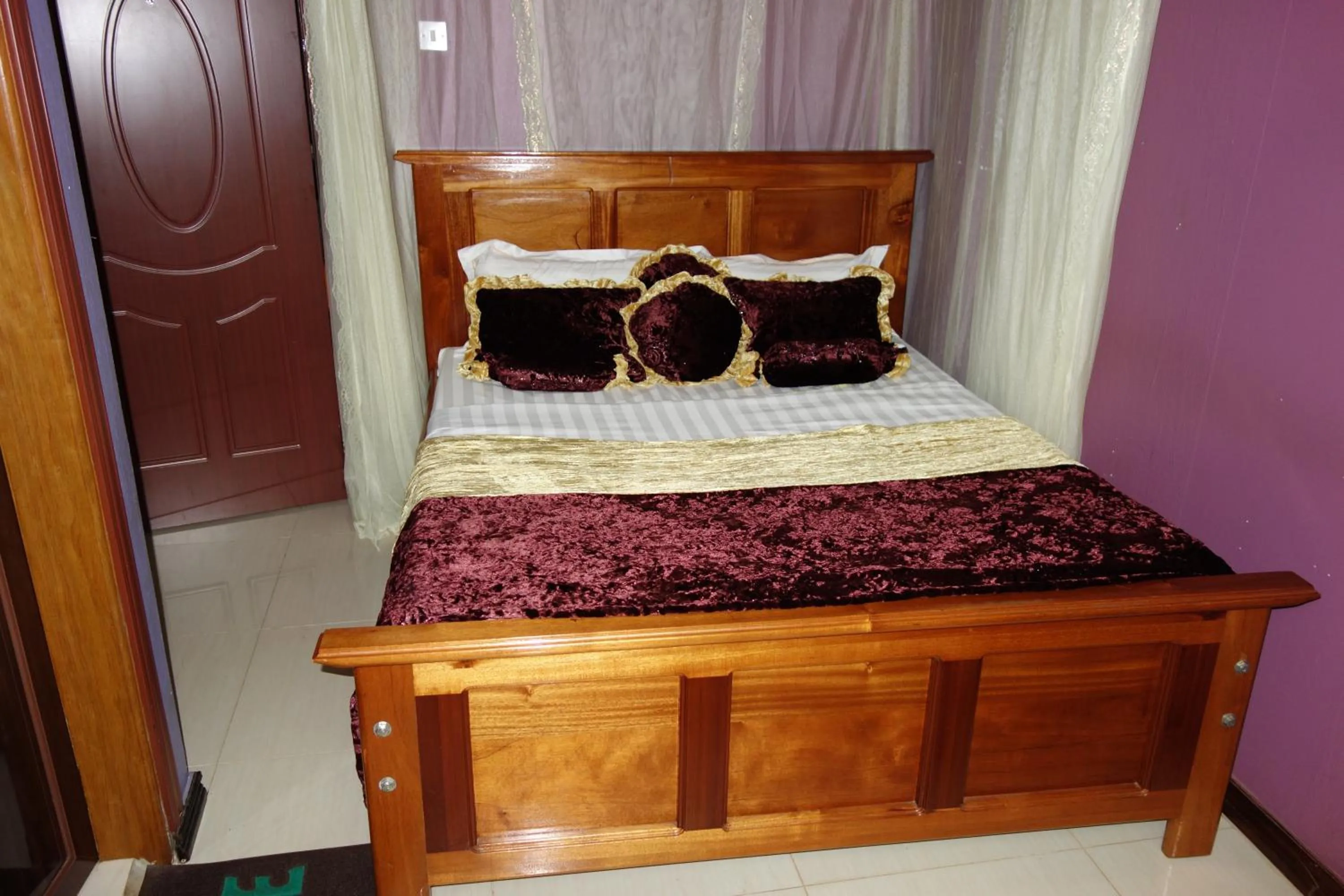 Bed in Impala Suites