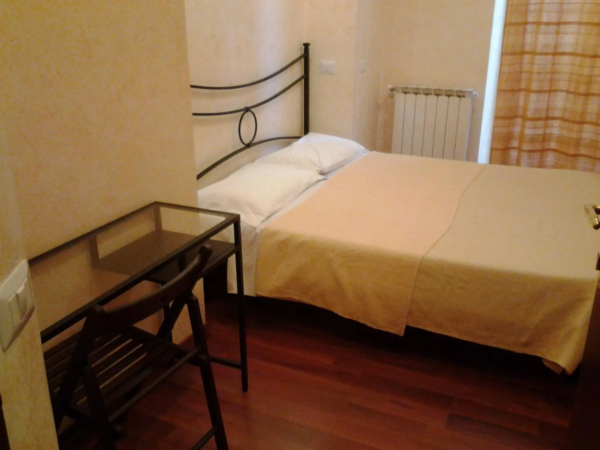 Photo of the whole room, Bed in Residenza Laterano