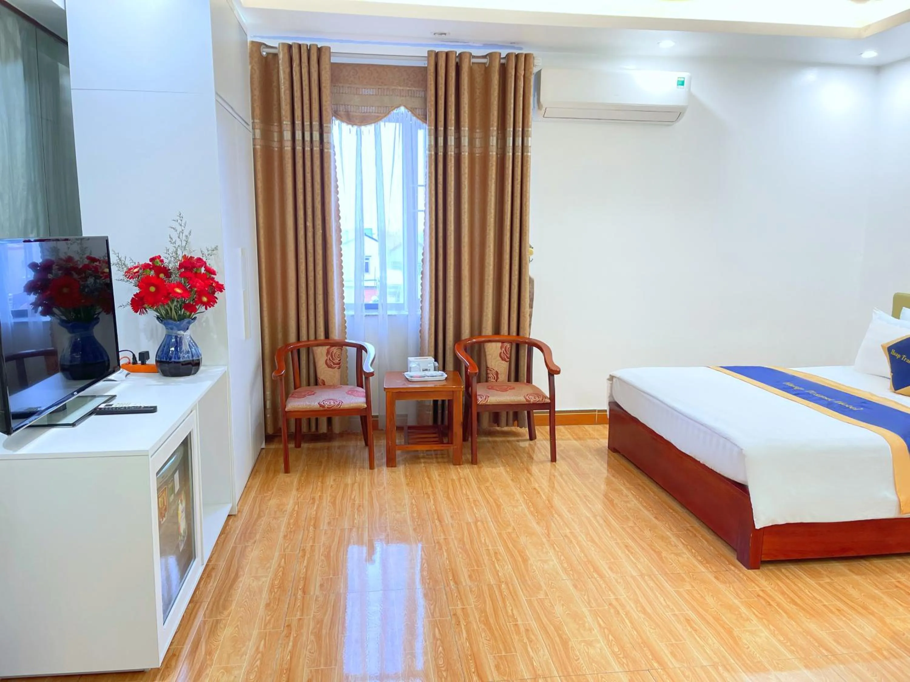 Seating area, Bed in HAAP Transit Hotel