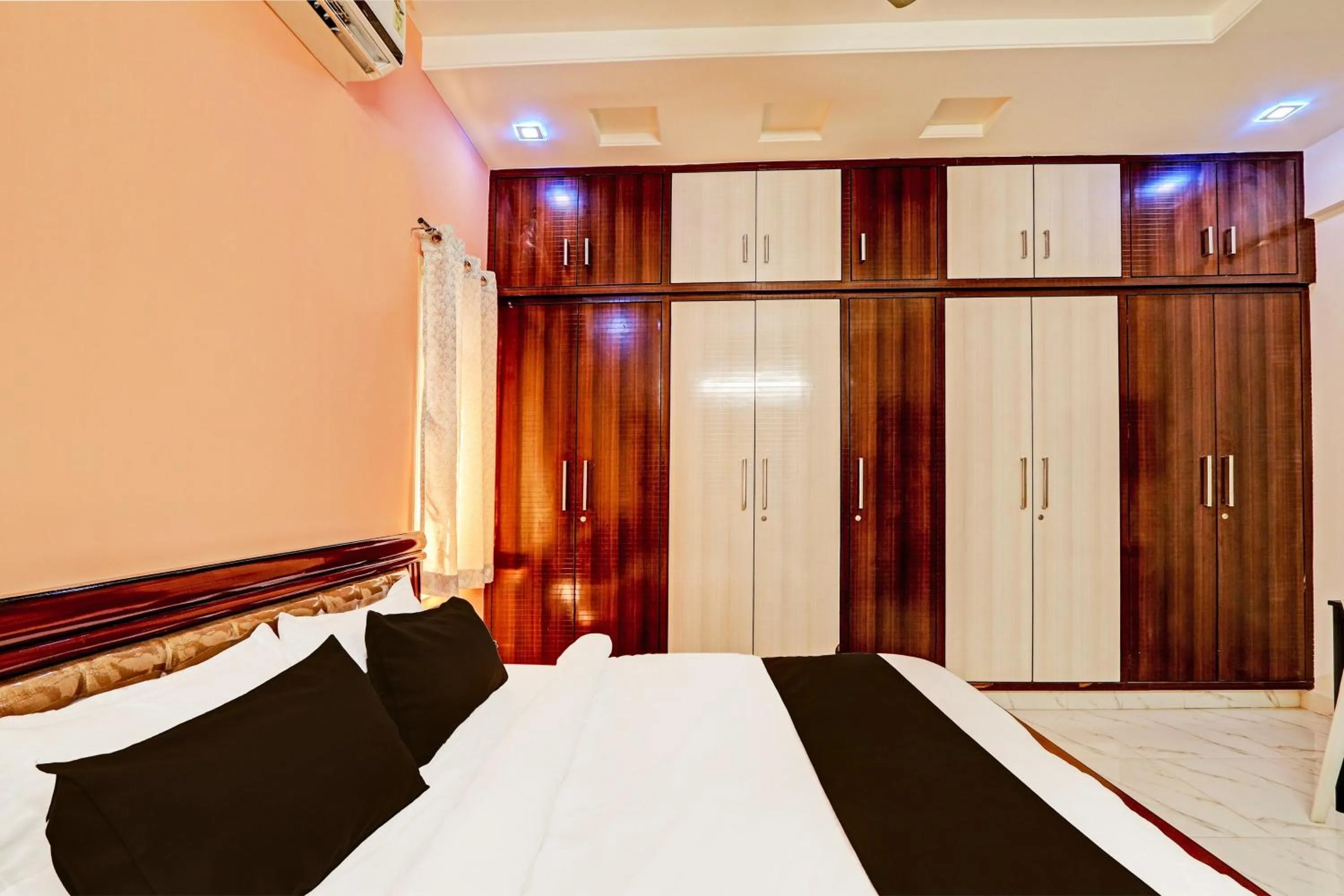 Bedroom, Bed in Super Collection O Q Suites Madhapur