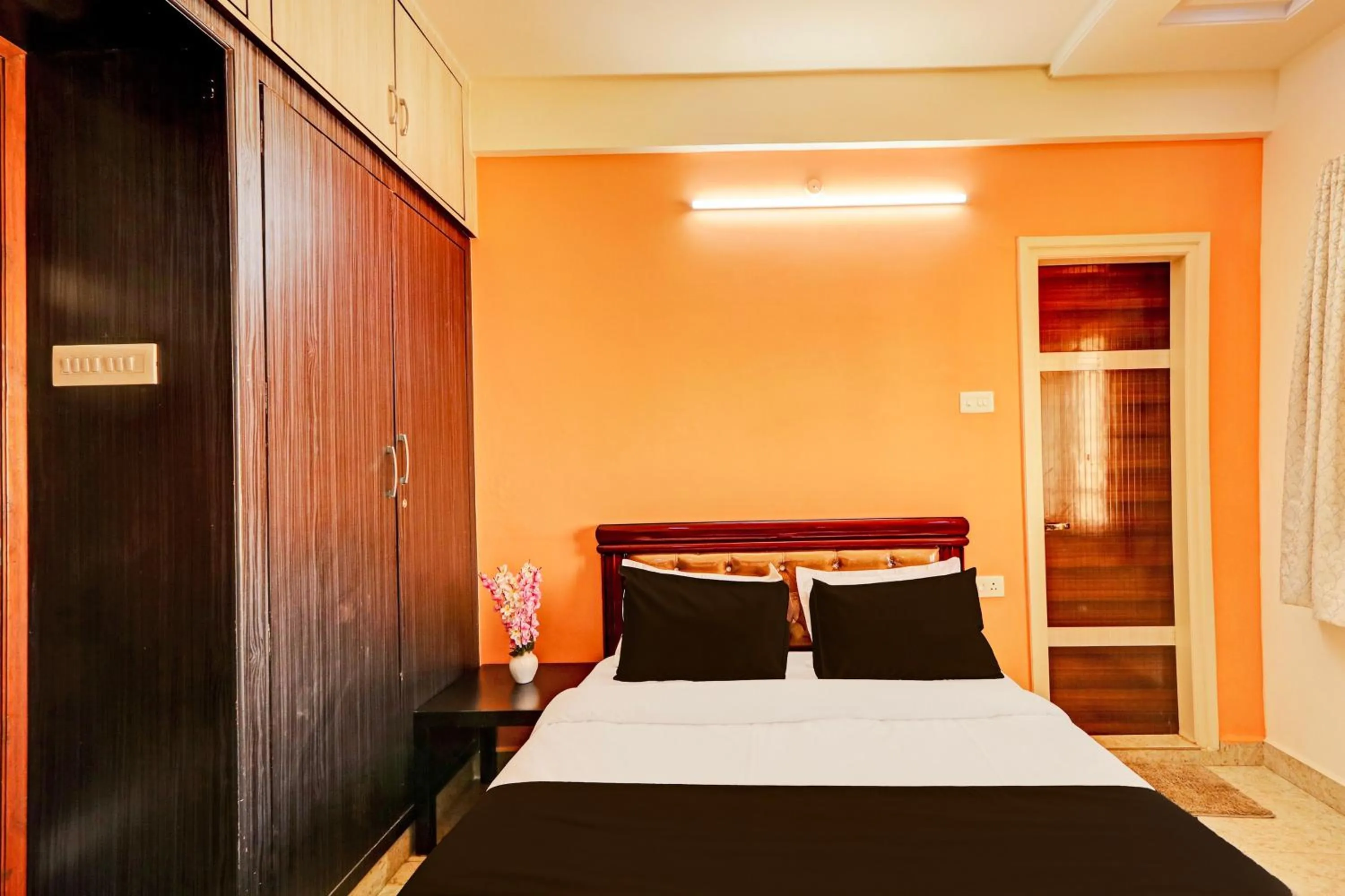 Bedroom, Bed in Super Collection O Q Suites Madhapur