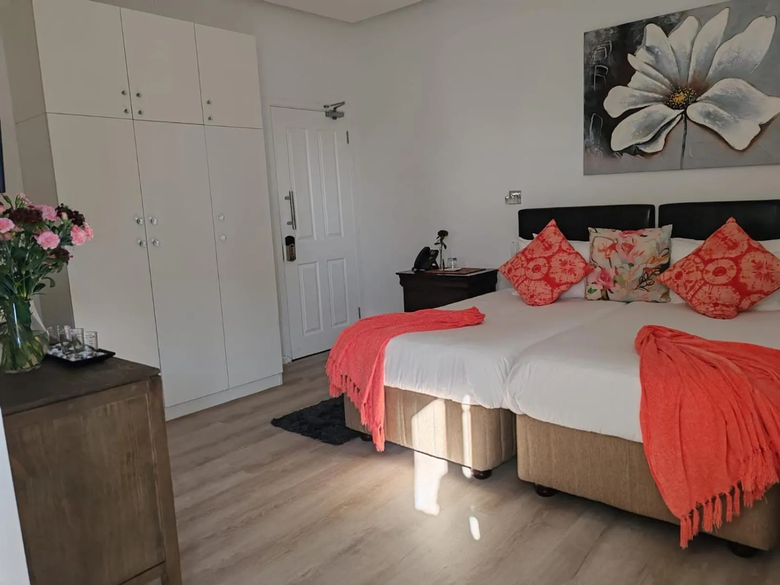 Bed in Point B Guest House -Sustainable Solar Energy