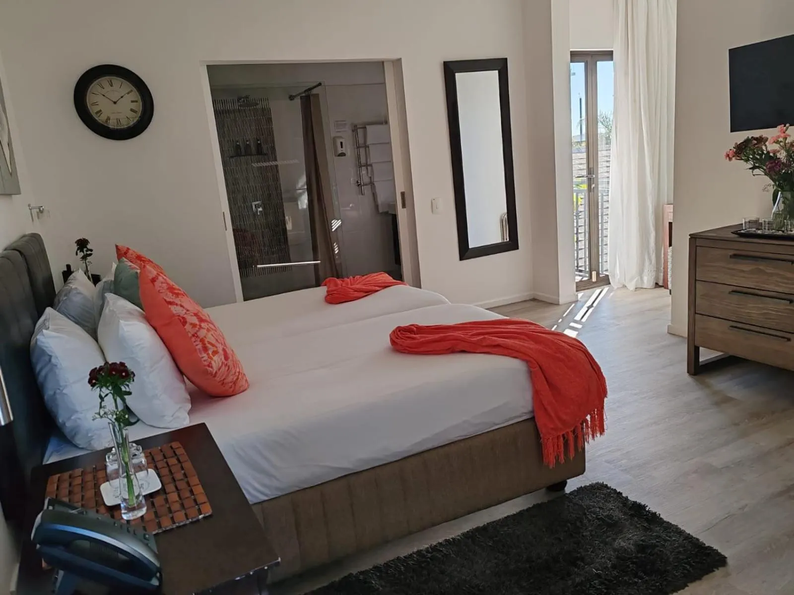 Bed in Point B Guest House -Sustainable Solar Energy