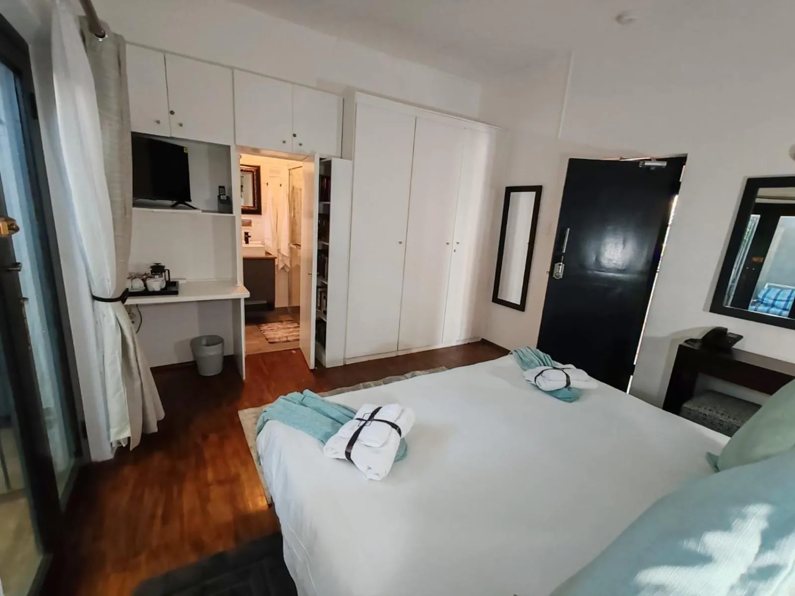 Bed in Point B Guest House -Sustainable Solar Energy