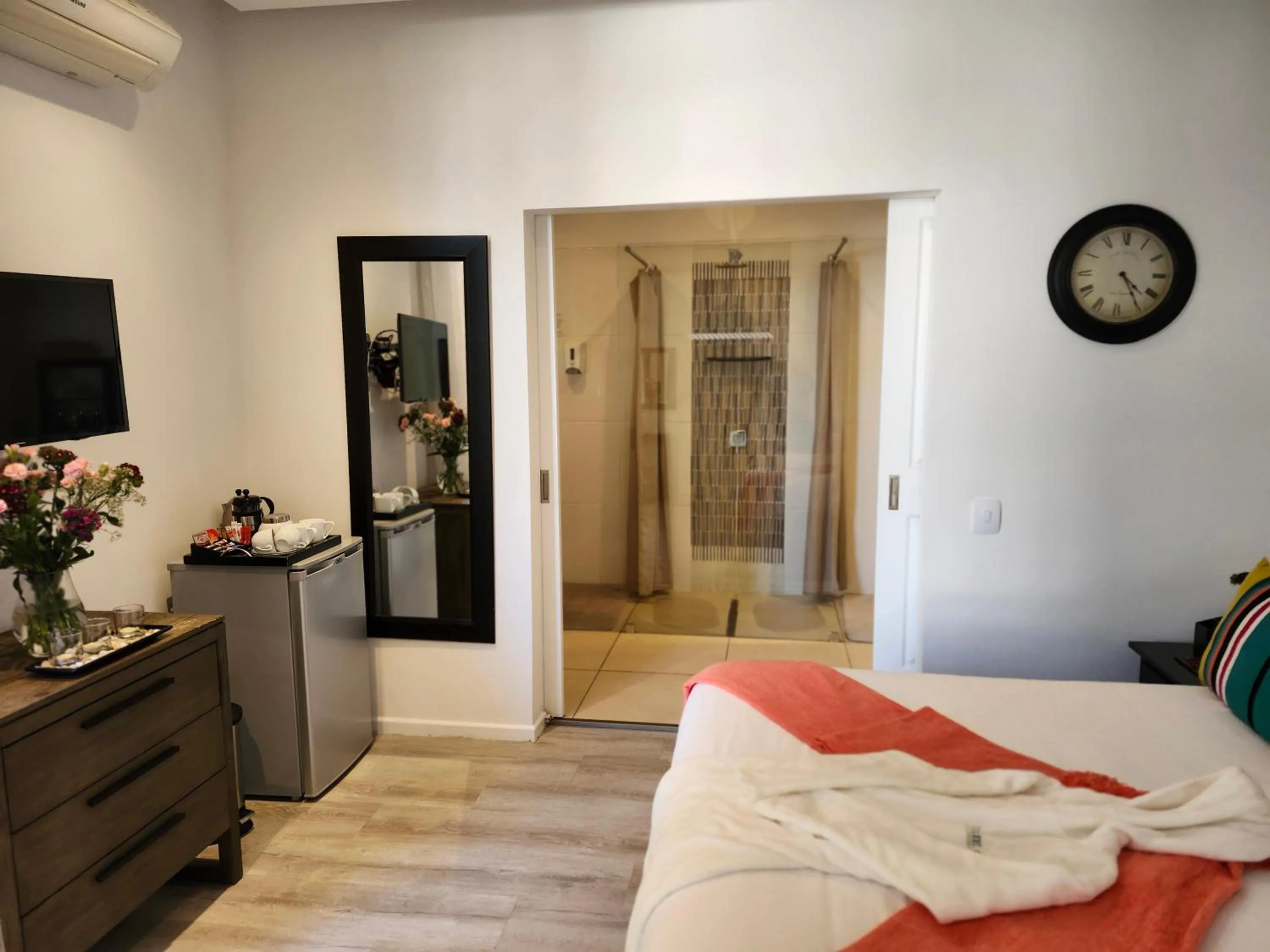 Bed in Point B Guest House -Sustainable Solar Energy