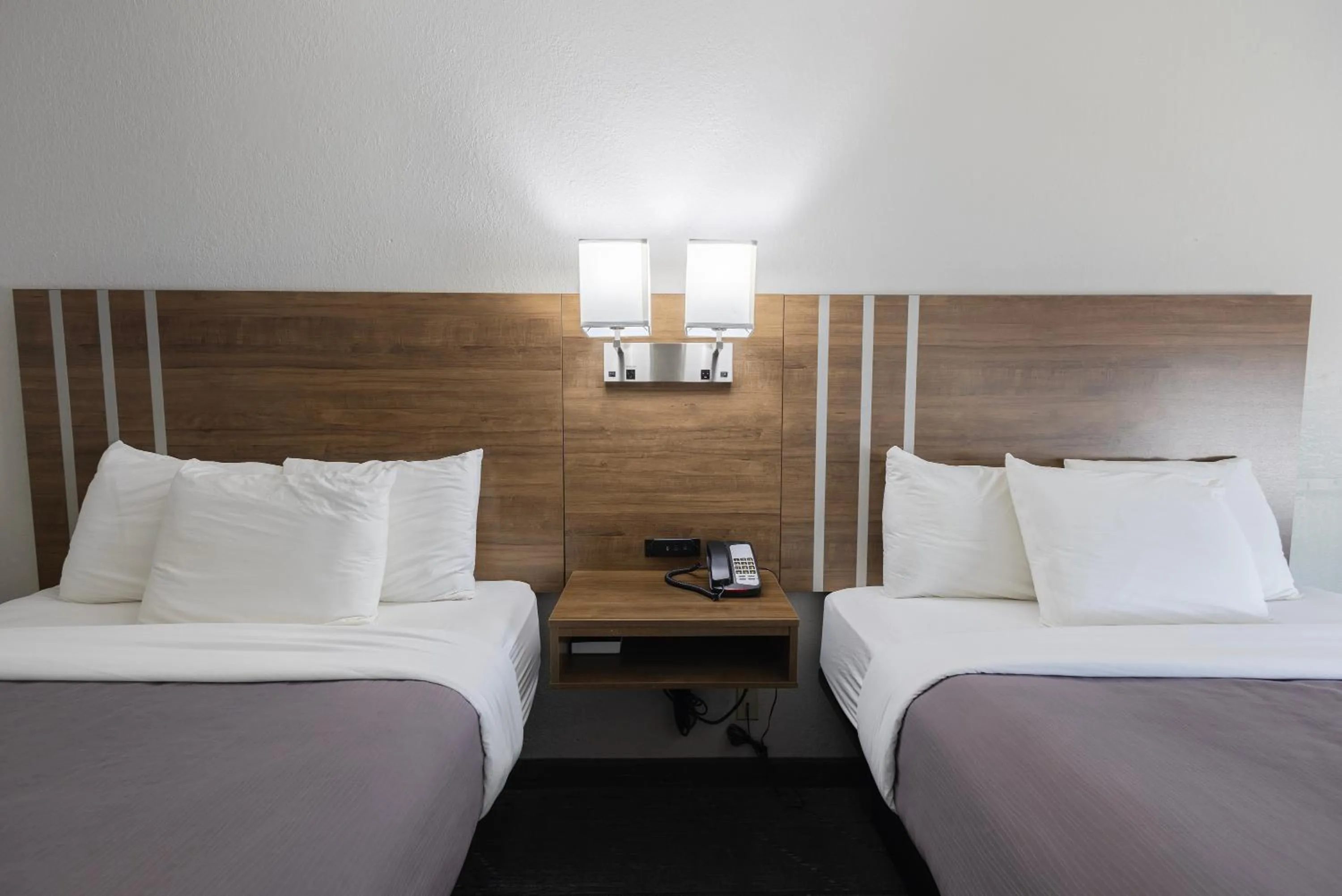 Bed in Countryside Inn and Suites