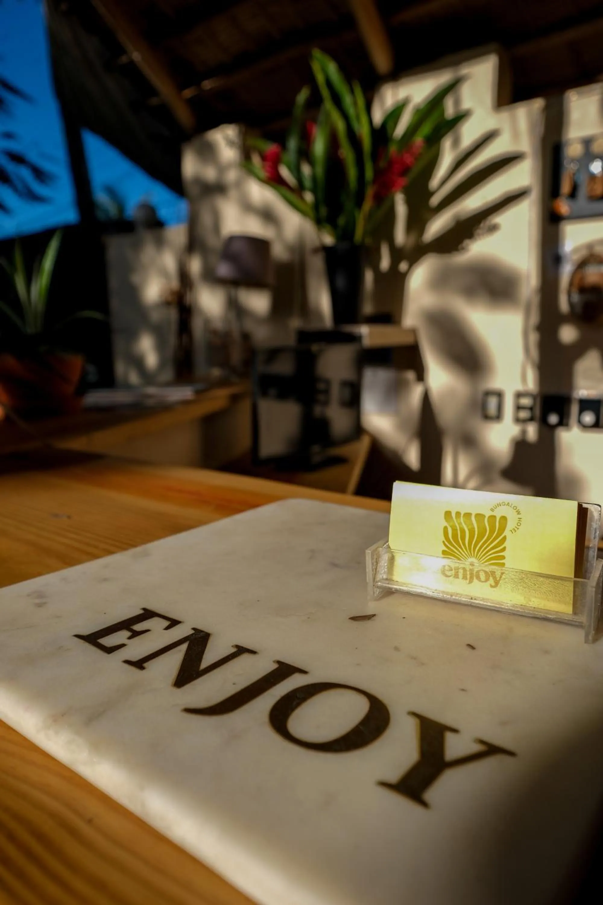 Property logo or sign in Hotel Enjoy