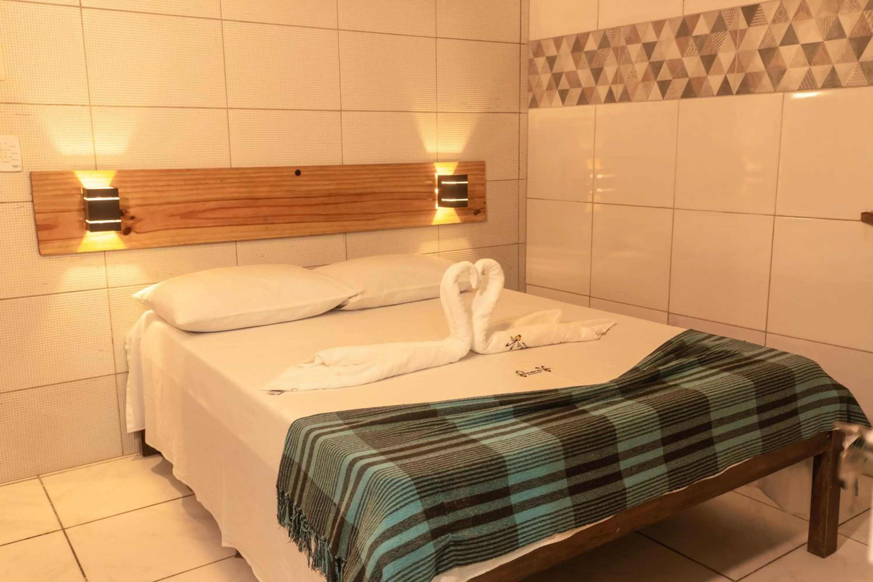 Bed in PV Pousada Passarela da Vila