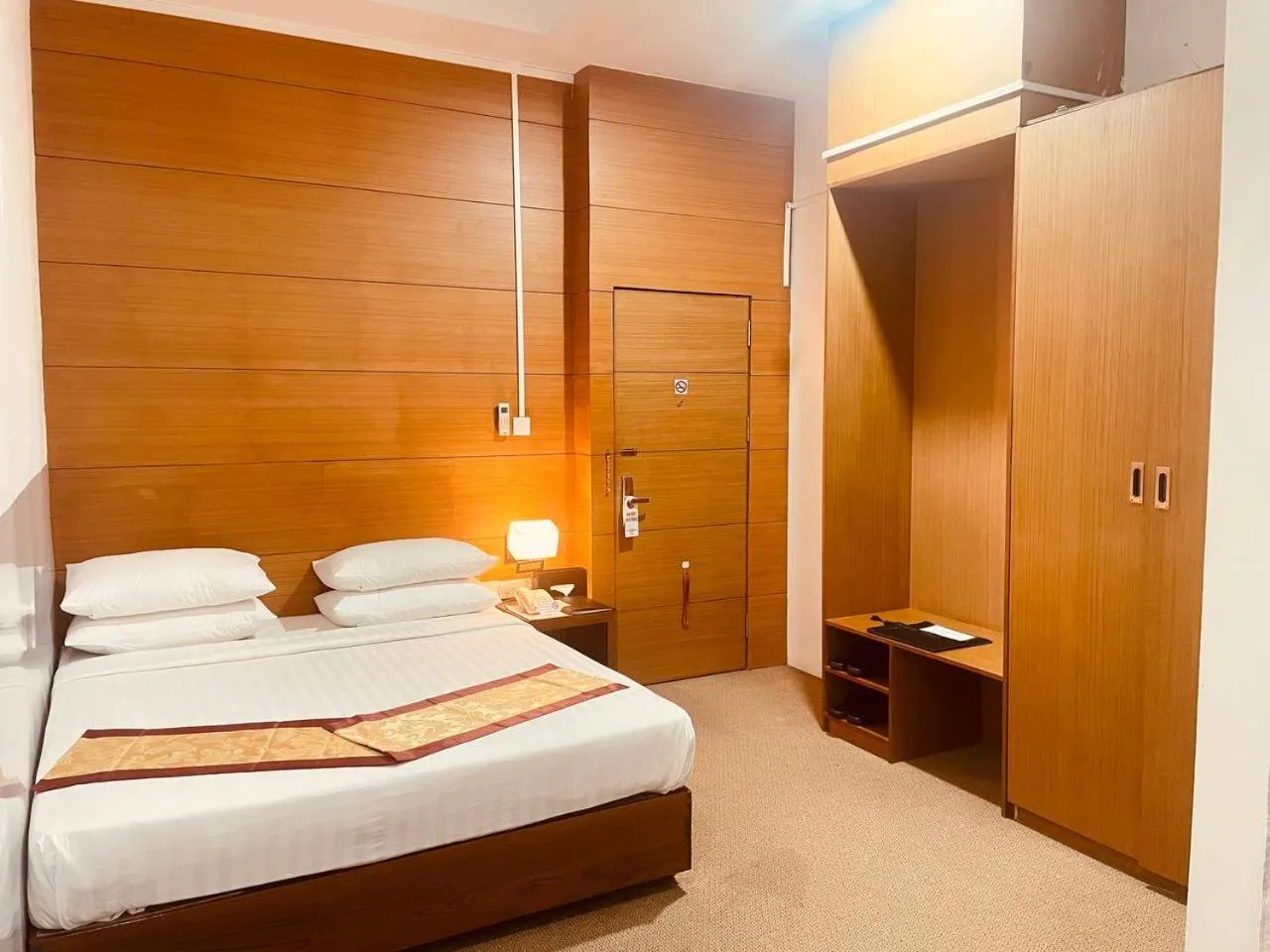 Photo of the whole room, Bed in YAMA HOTEL & ROOFTOP BAR