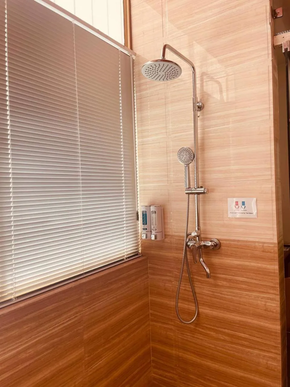 Shower in YAMA HOTEL & ROOFTOP BAR