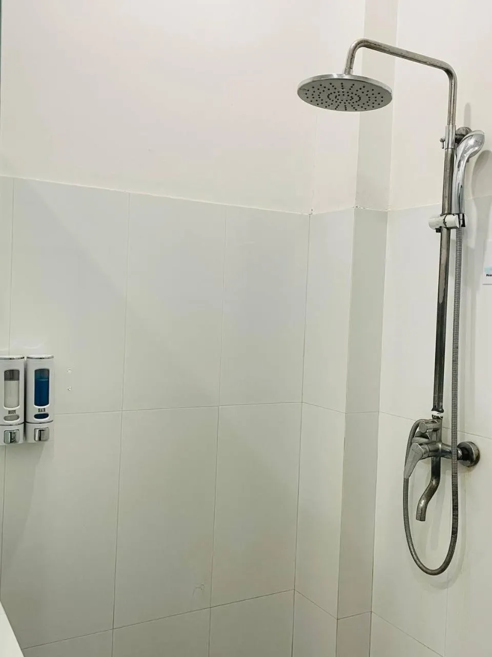Shower in YAMA HOTEL & ROOFTOP BAR