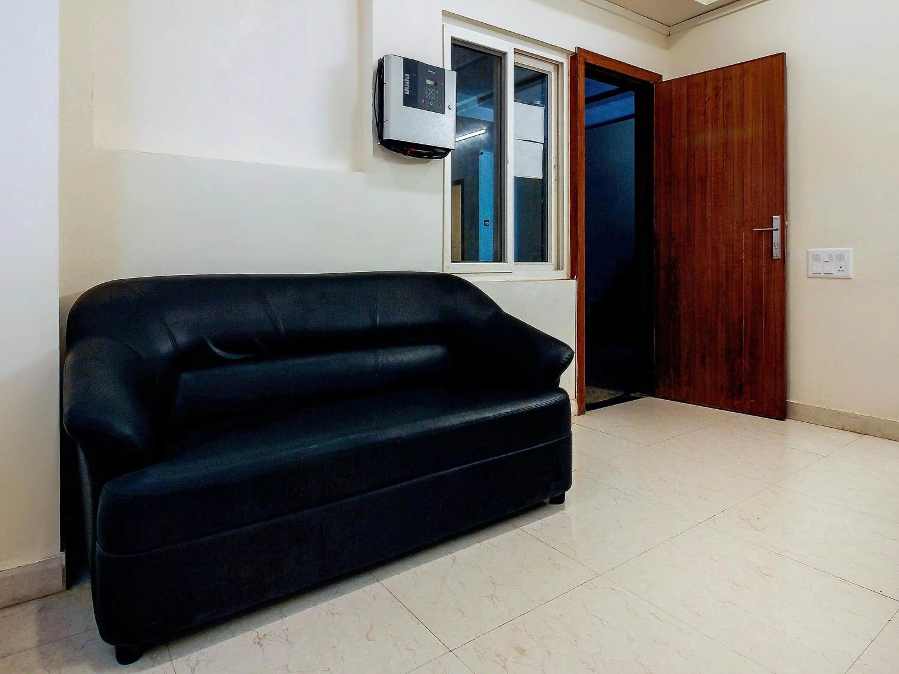 Bedroom in Hotel O Elite Spaces Puppalaguda