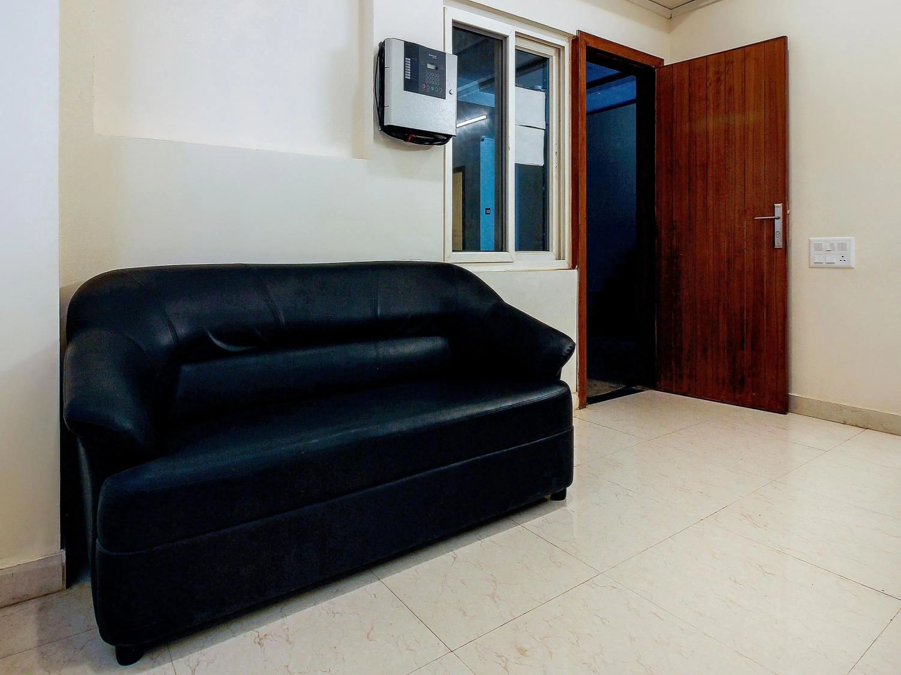 Bedroom in Hotel O Elite Spaces Puppalaguda