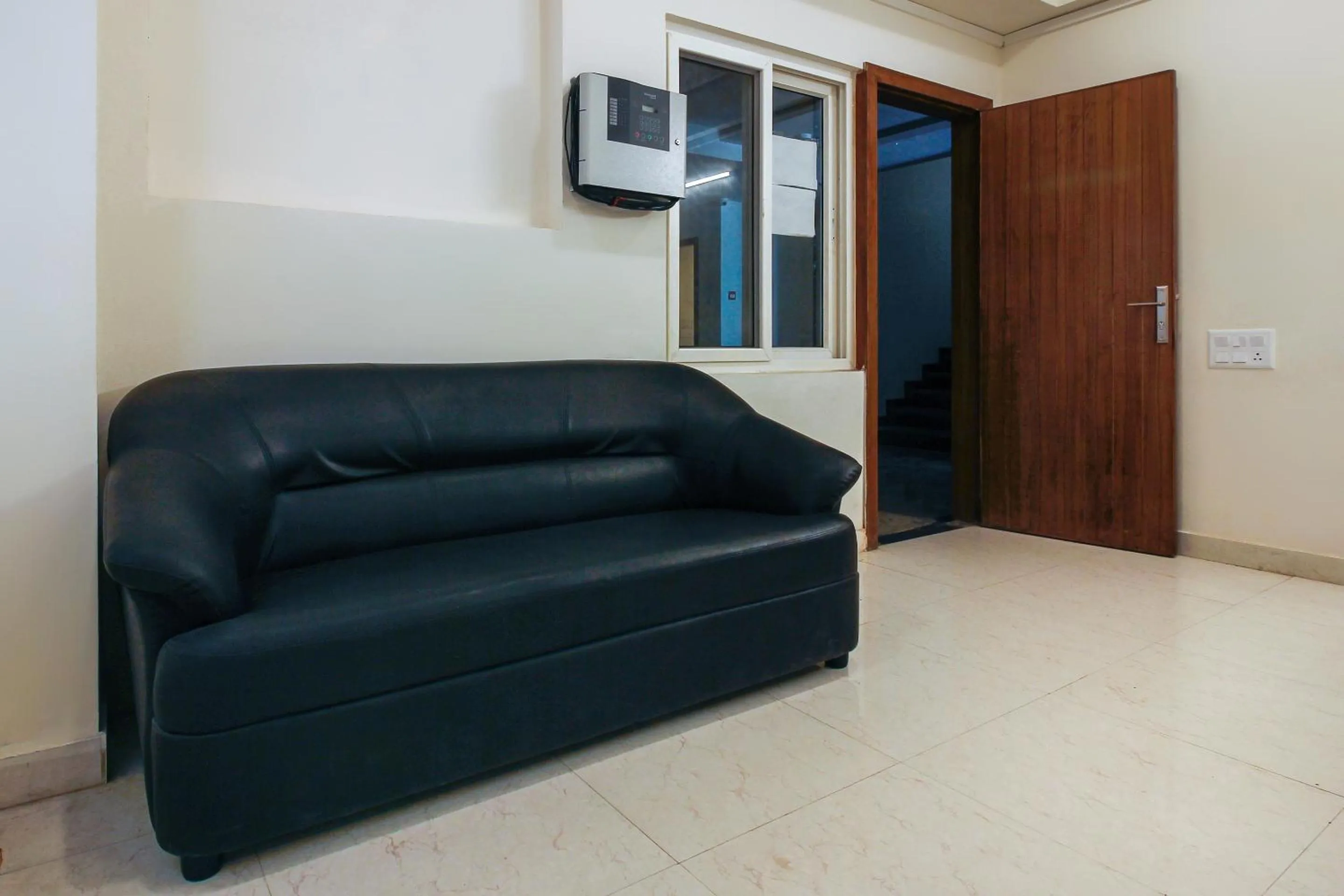 Bedroom in Hotel O Elite Spaces Puppalaguda